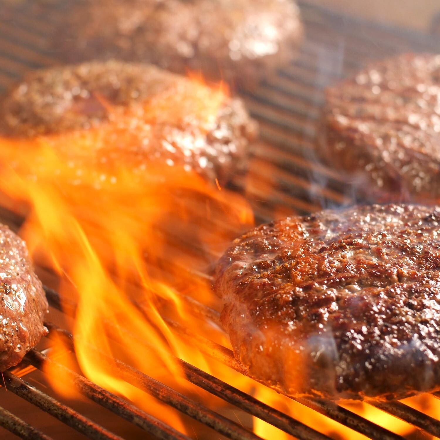 Kamado Joe Big Joe III 24-in Ceramic Kamado Grill Bundle - Grilling Burgers - Lifestyle thumbnail