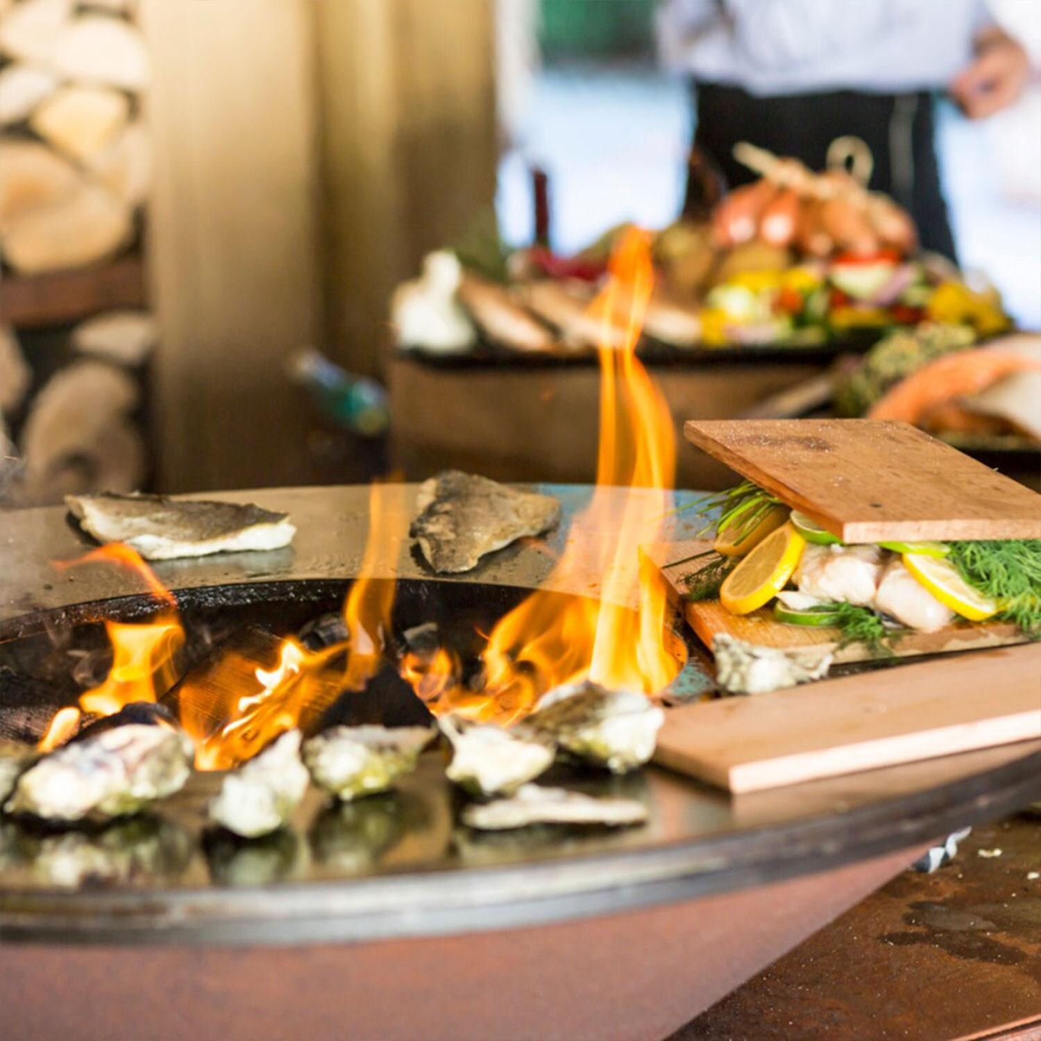 OFYR OCS-85 Classic Storage Corten 85 35 Inch Wood-Fired Flat Top Grill - Veggies - Close Up Vew - Lifestyle thumbnail