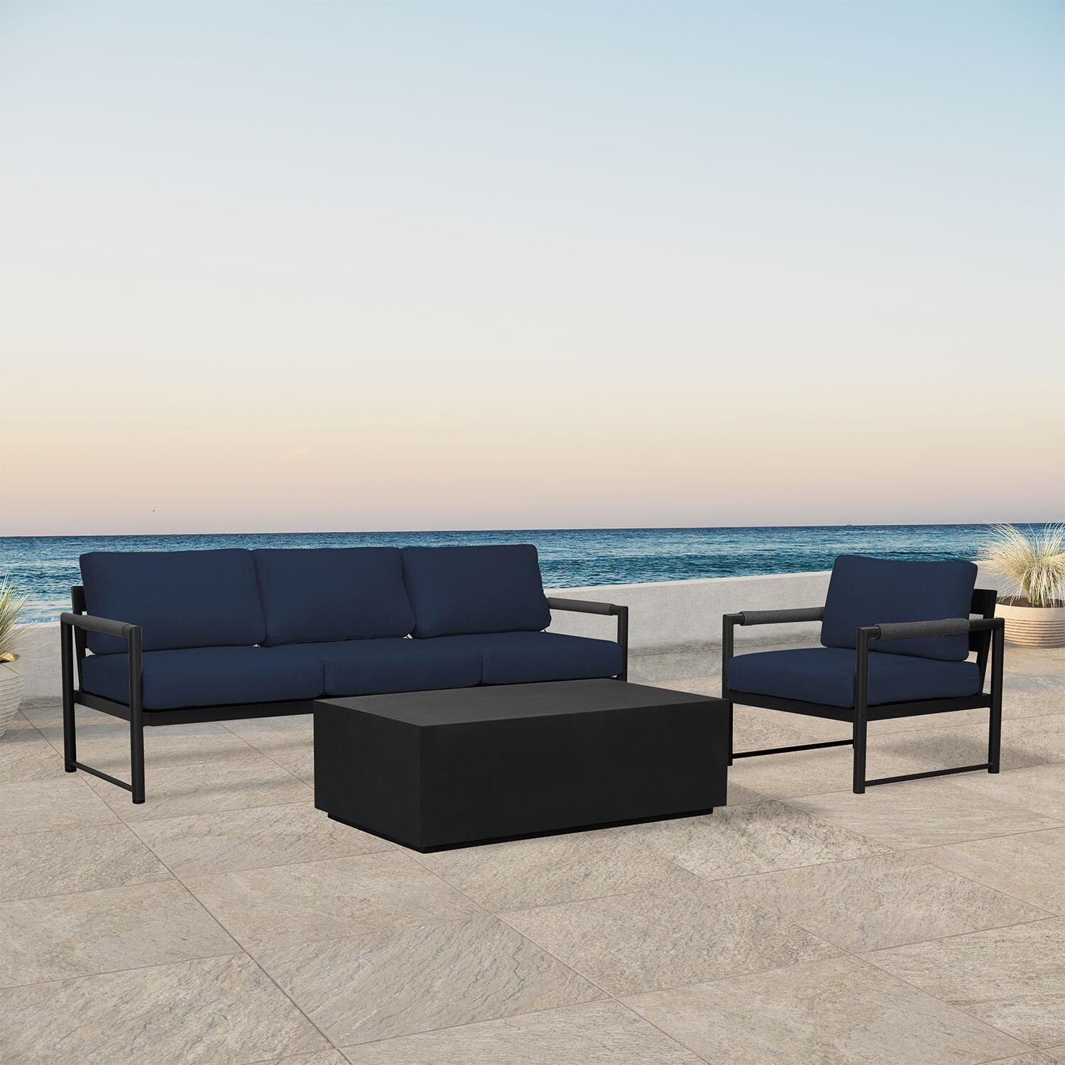 Lakeview AVEBAY-BK-CO-SET130-IN Avenue Bay Black/Carbon 3 Pc Sofa Set - Spectrum Indigo - Angled On Patio - Lifestyle thumbnail