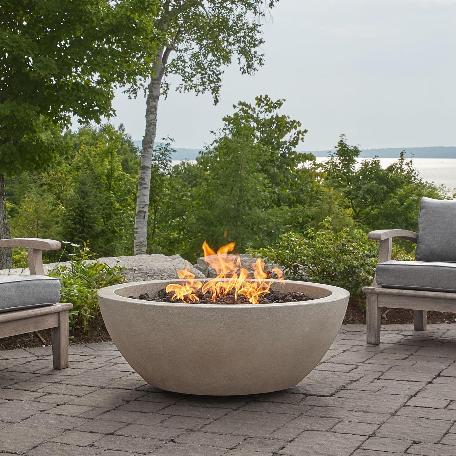 Dustyview 42 Inch Round Glass Fiber Reinforced Concrete Propane Fire Bowl in Fog by BBQGuys Signature - Back Patio - Lifestyle thumbnail