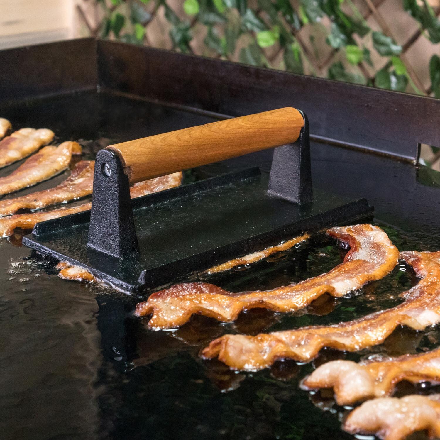 Blackstone 1543 4-Piece Breakfast Kit - Griddle Press In Use - Lifestyle thumbnail