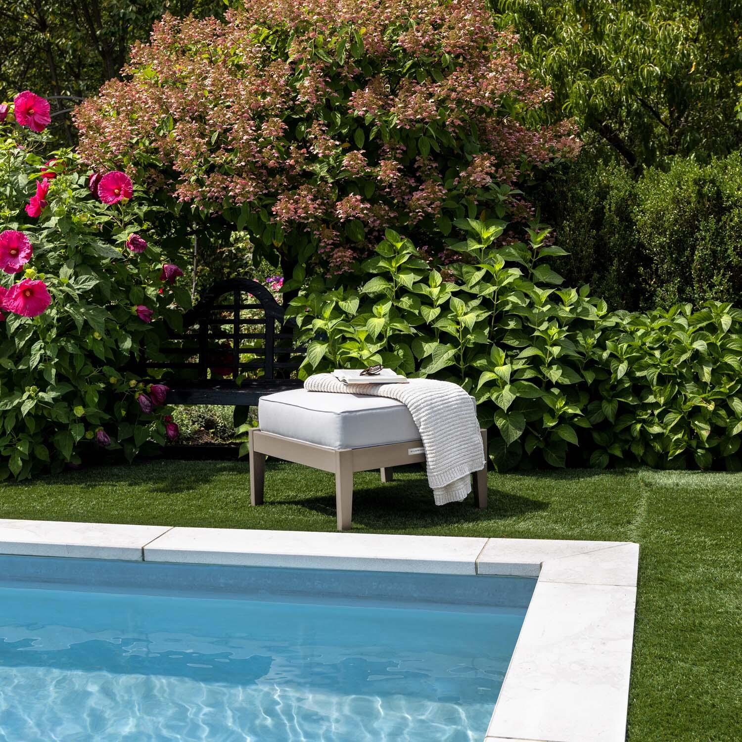 Blushing Bay Recycled Plastic Ottoman in Bliss Linen/Woodland Brown by Lakeview Outdoor Designs - By Pool - Lifestyle thumbnail