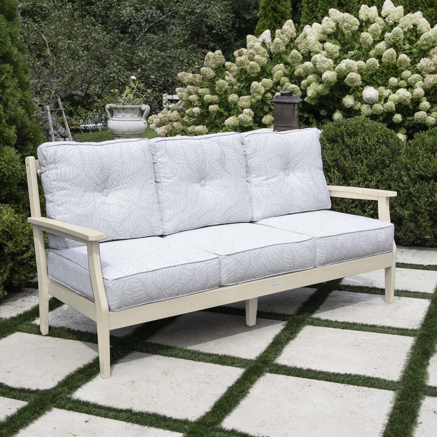 Blushing Bay 3 Person Recycled Plastic Sofa in Lively Parchment/Whitewash by Lakeview Outdoor Designs - Left Angled - Lifestyle thumbnail
