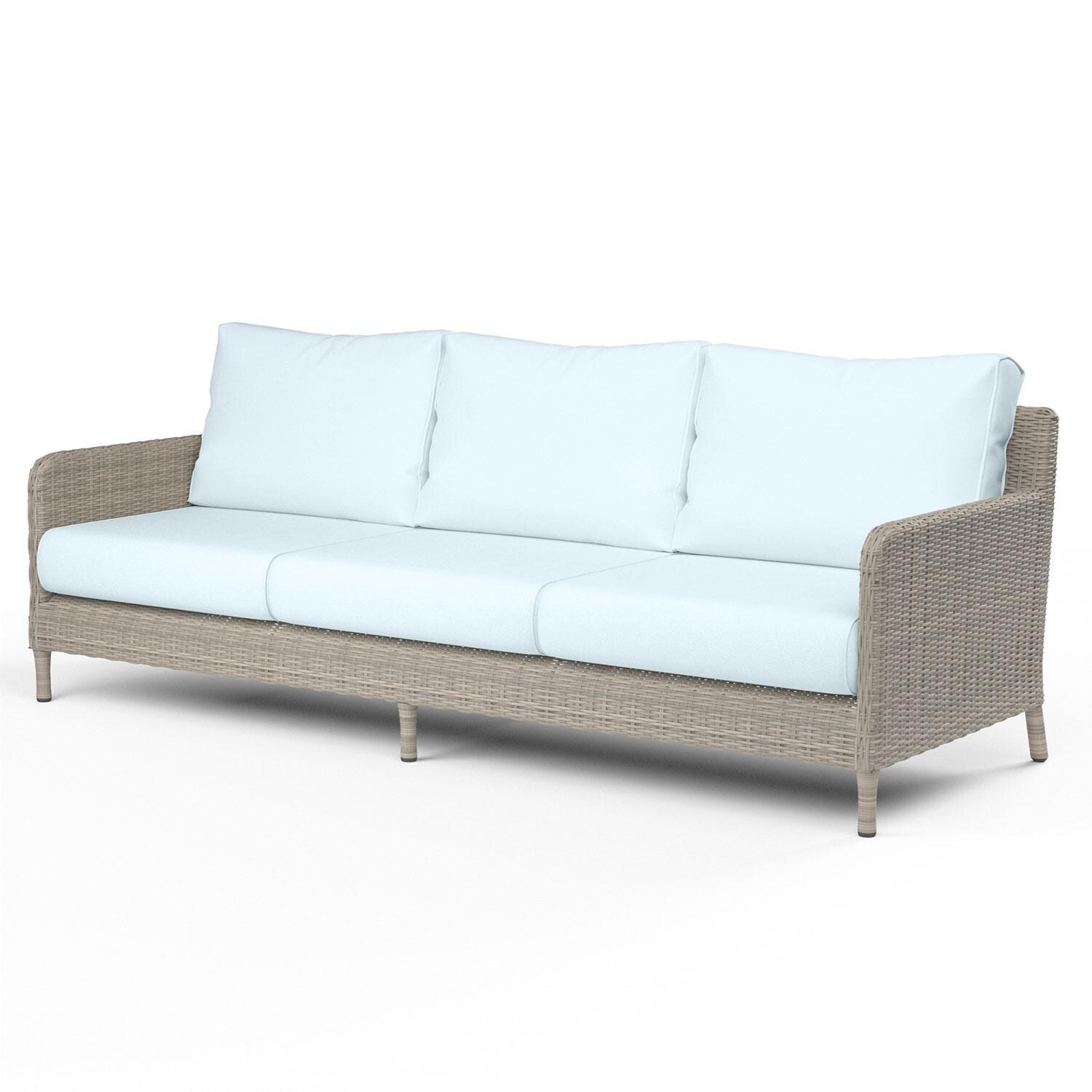 Manhattan Wicker Patio Sofa in Canvas Skyline w/ Self Welt By Sunset West - Display - White Background thumbnail