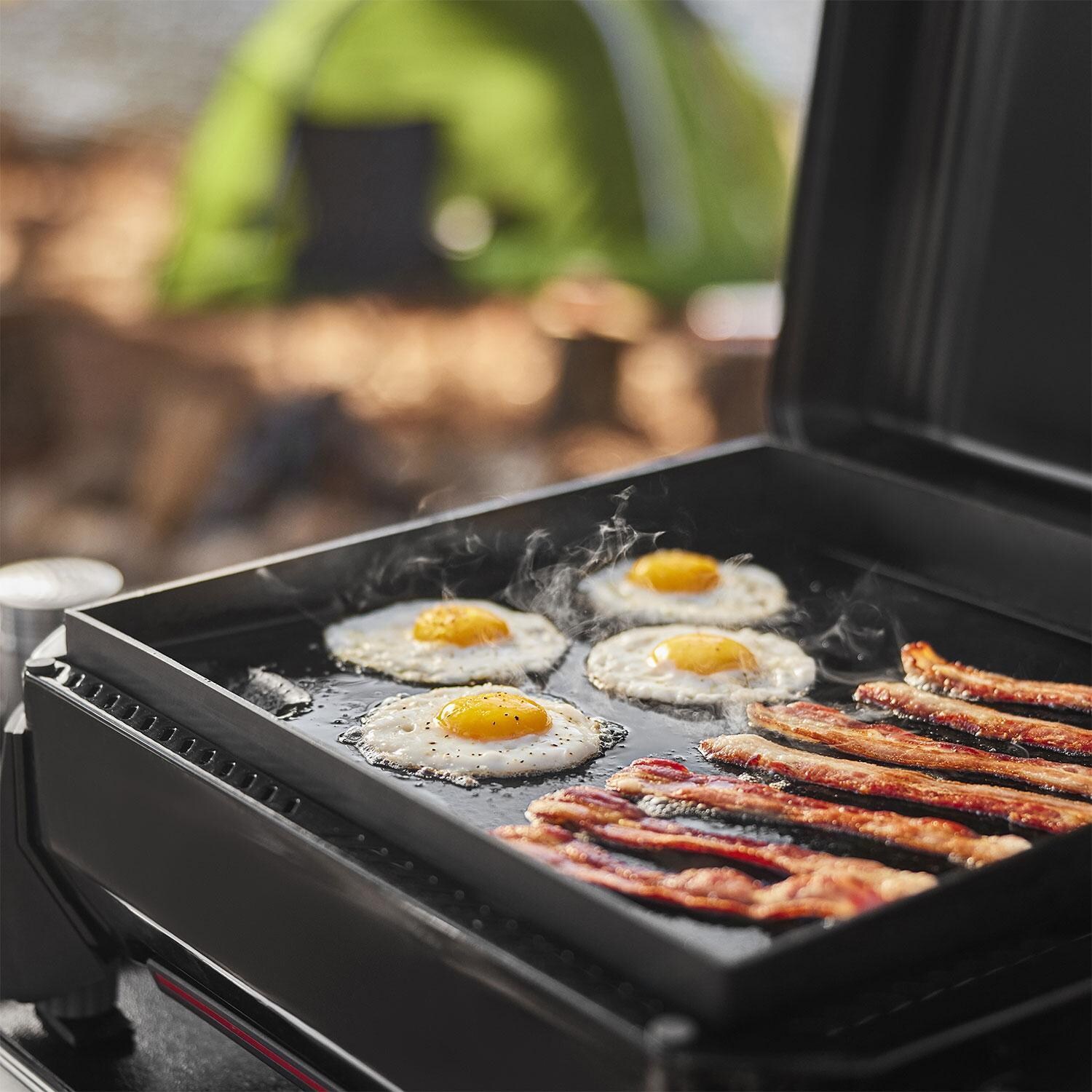 Weber Traveler 1500012 17-Inch Portable Griddle - Cooking Breakfast on Griddle - Lifestyle thumbnail