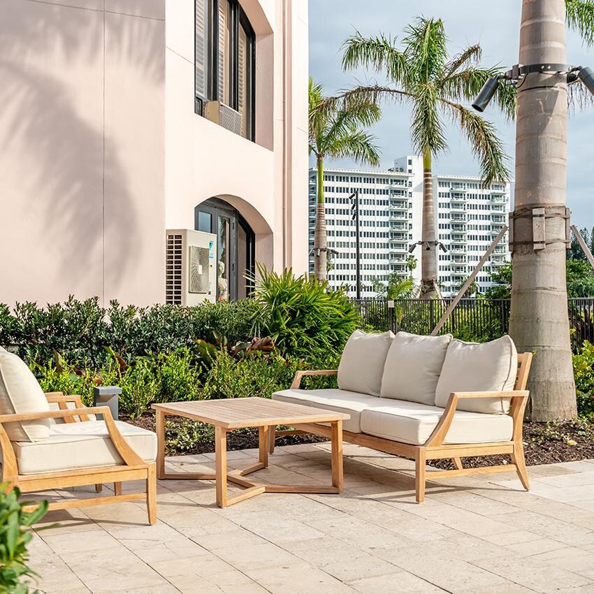 Teak + Table Charleston Sofa in Natural - Patio - Lifestyle thumbnail