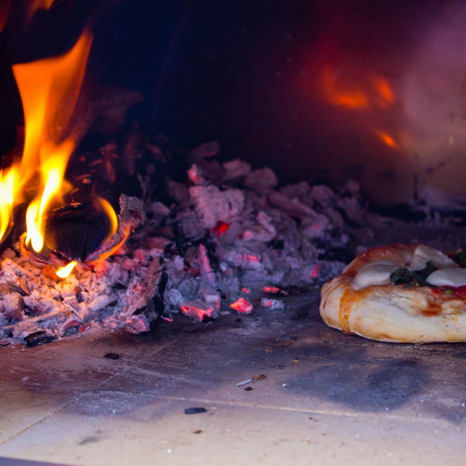 Bella Grande Wood Fired Outdoor Pizza Oven - Cooking Pizza thumbnail