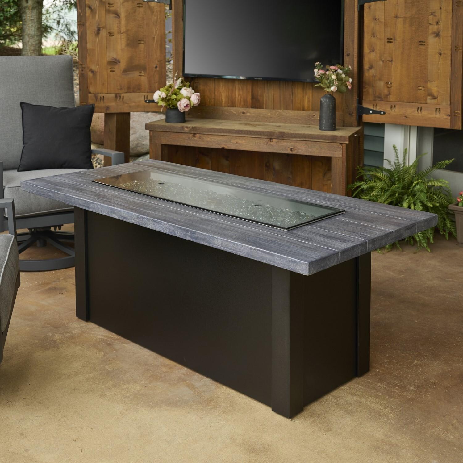 Havenwood 62 Inch Propane Fire Pit Table W/ Carbon Grey Top & Black Base - Glass - Lifestyle thumbnail