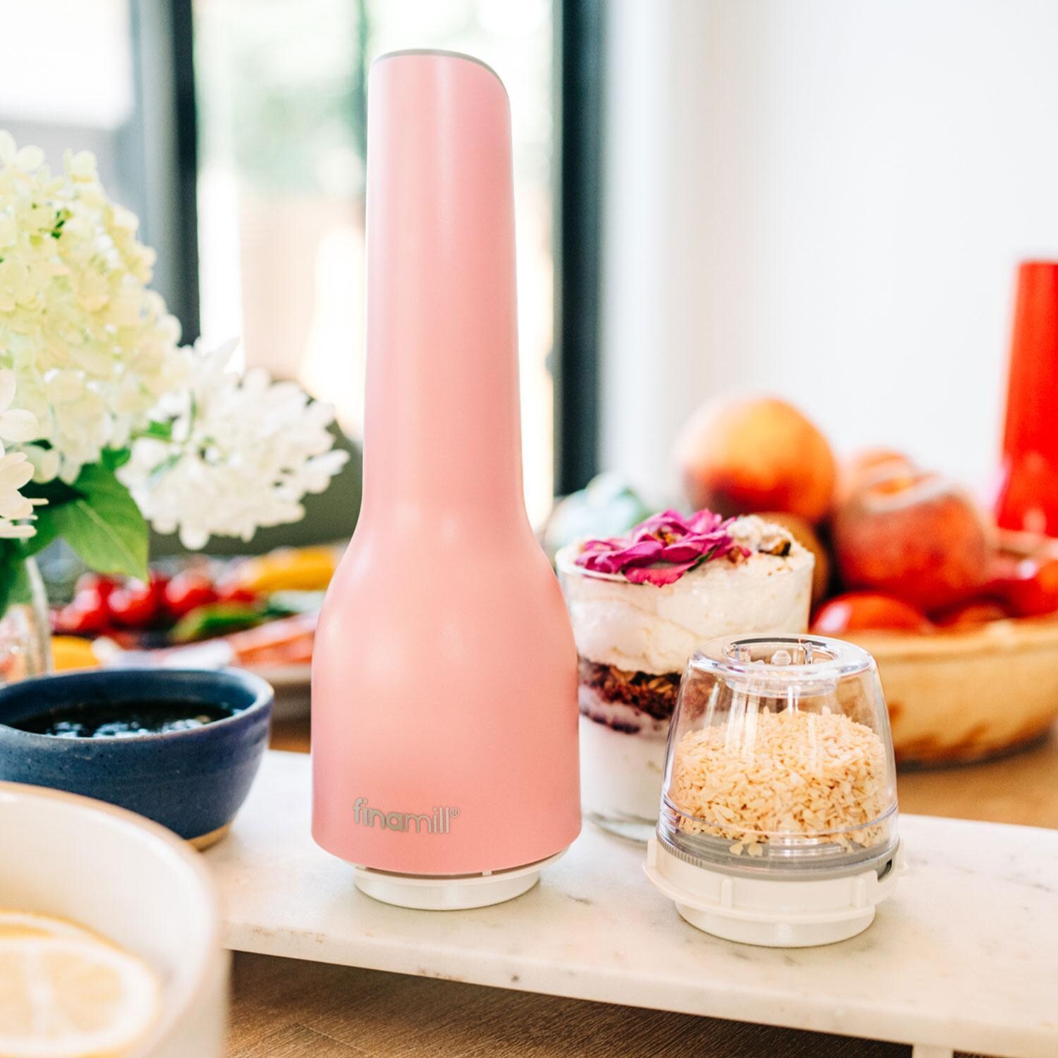 FinaMill GP813437-111PIN Classic Rechargeable Spice Grinder in Cotton Candy w/ 1 Everyday Pod & 1 Peppercorn Pod - In Use - Lifestyle thumbnail