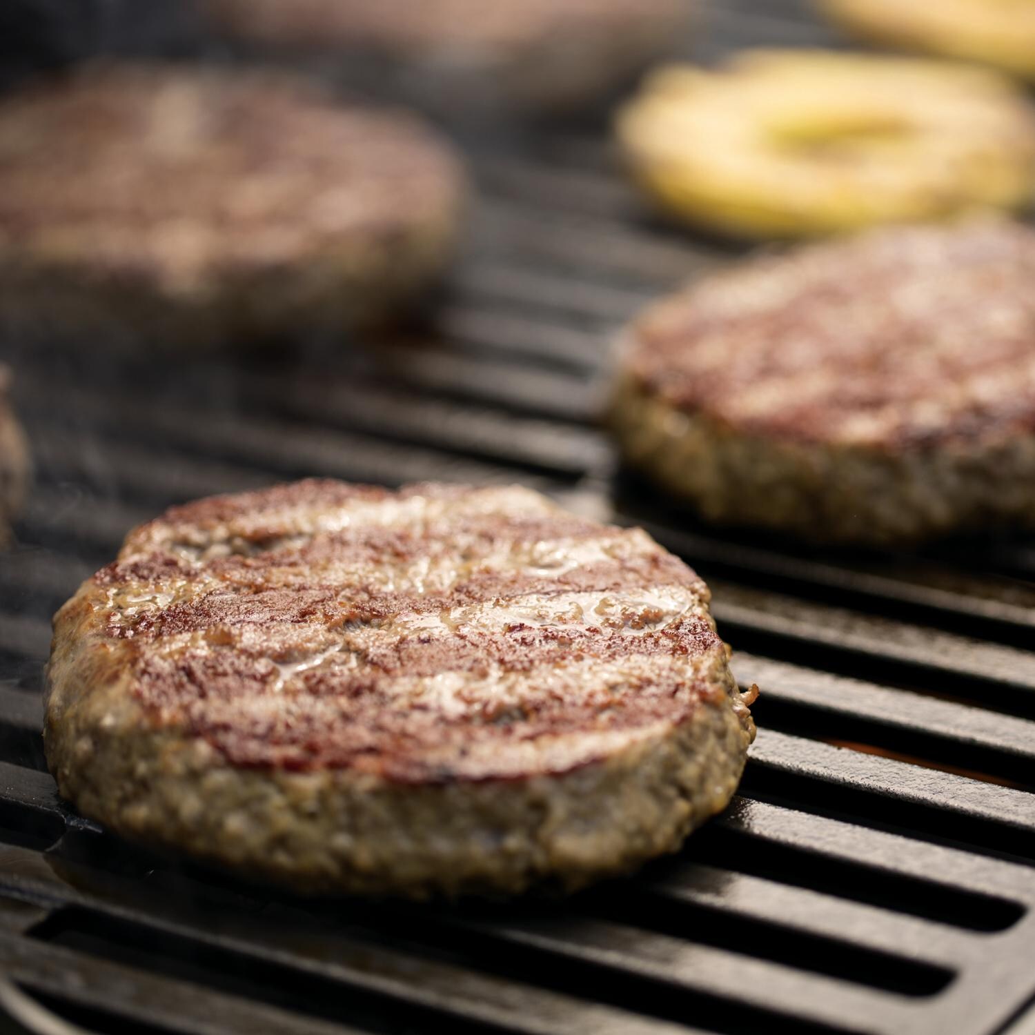Weber Porcelain Cast Iron Cooking Grates with Food thumbnail