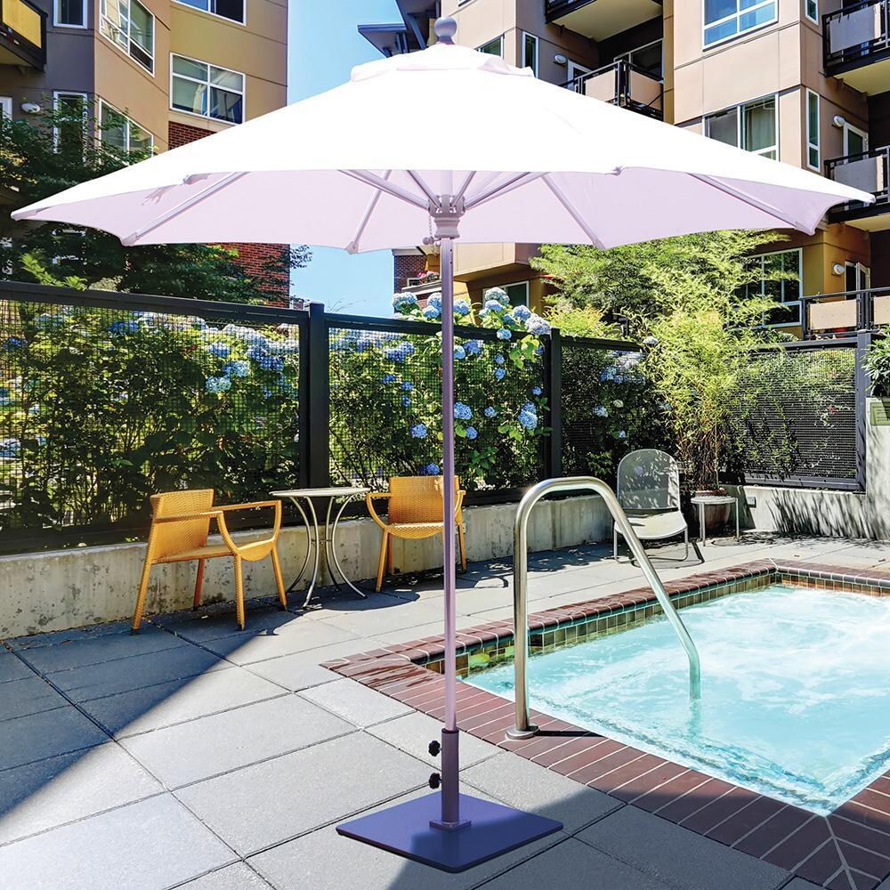 Galtech 9 Ft. Octagonal Patio Umbrella W/ Manual Lift - Lifestyle View - Shown In Silver Finish W/ Natural Sunbrella Fabric (Umbrella Base Not Included) thumbnail