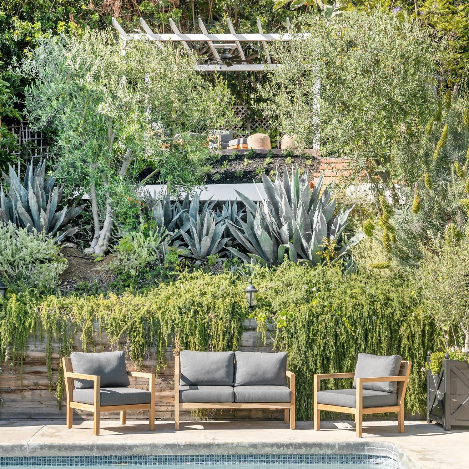 Teak + Table Monday Teak Patio Loveseat in Natural - Landscape - Lifestyle thumbnail