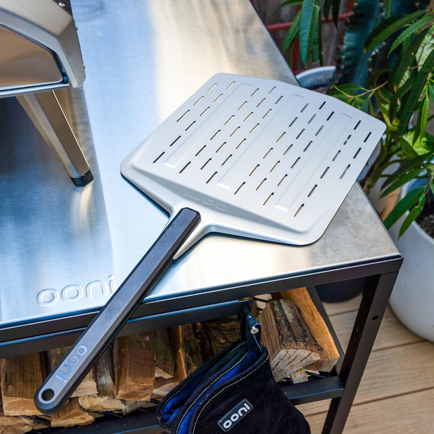 Ooni UU-P06401 12-Inch Perforated Pizza Peel - Lifestyle thumbnail