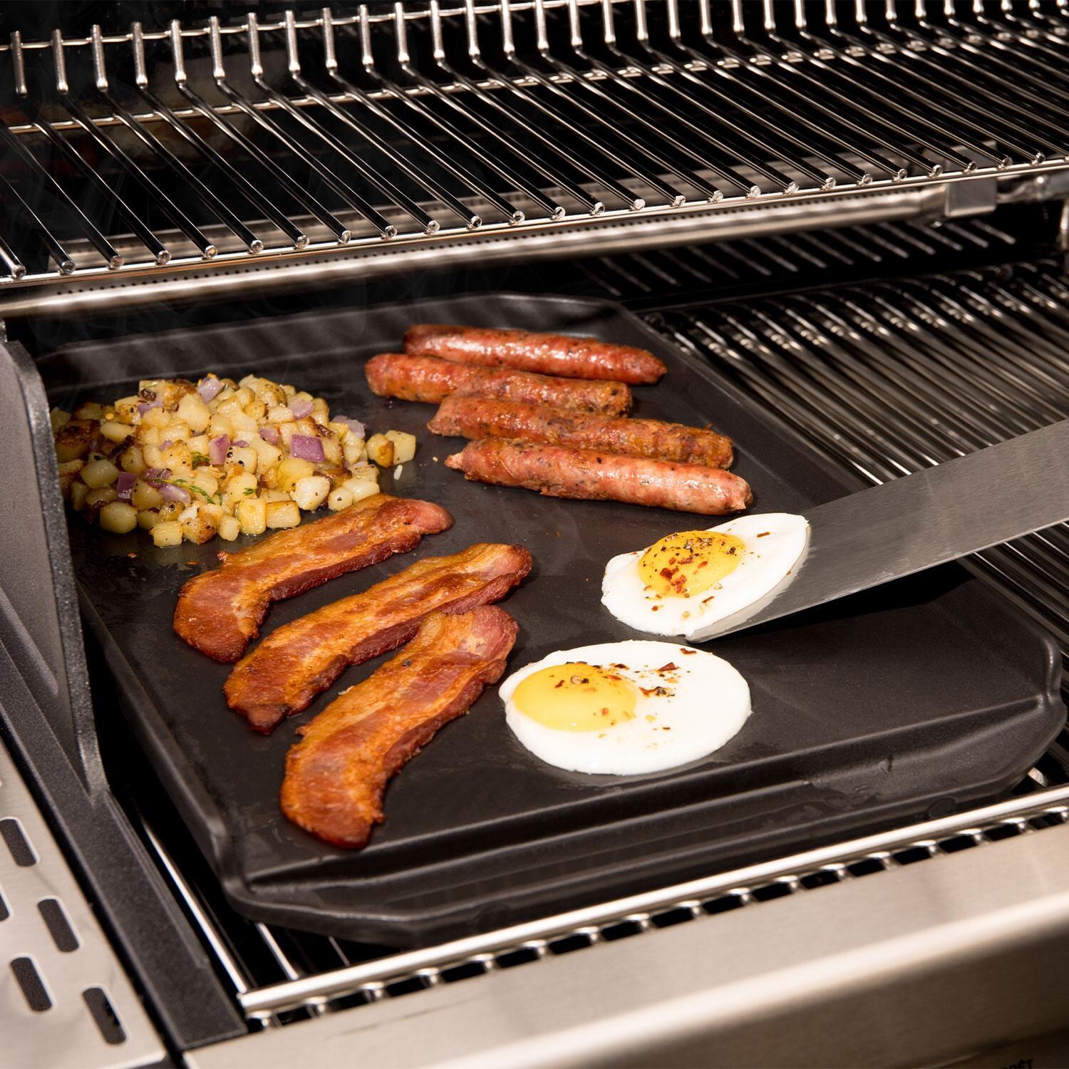 Broil King 11342 Cast Iron Plancha - Flipping Eggs - Lifestyle thumbnail