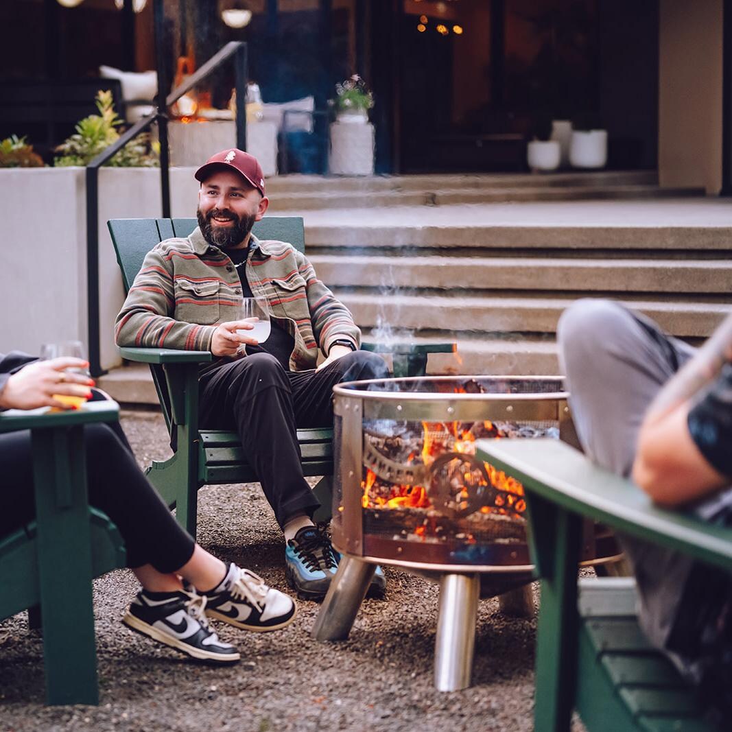 24-in Round Stainless Steel Wood Burning Fire Pit - With Friends - Lifestyle thumbnail