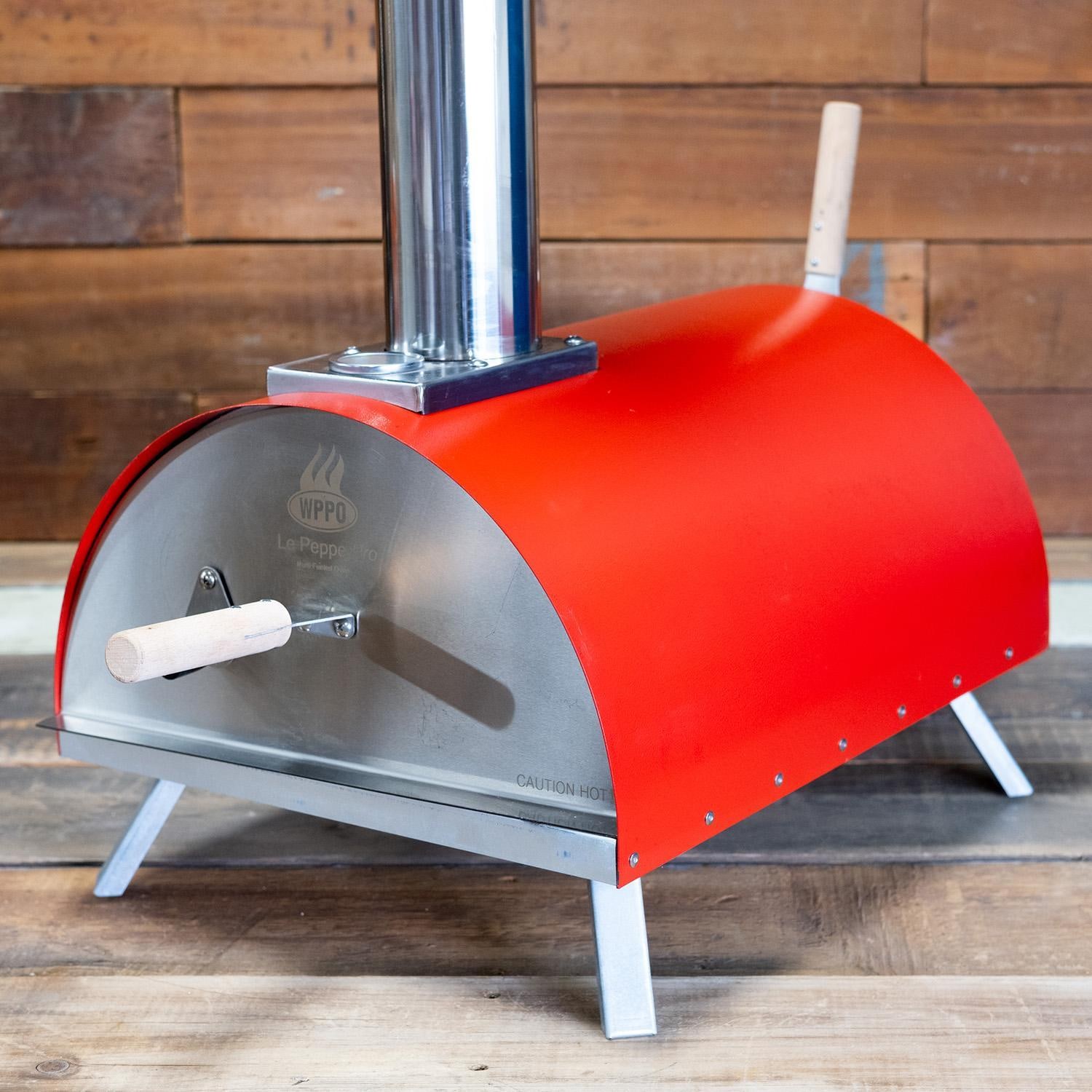 WPPO WKE-01-RED Le Peppe Portable Red Wood Fired Pizza Oven  - Close Up Angled View - Lifestyle thumbnail