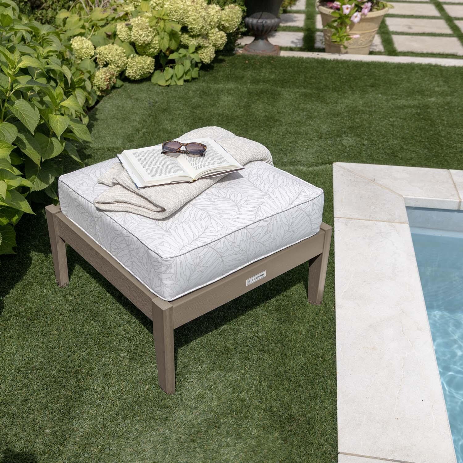 Blushing Bay Recycled Plastic Ottoman in Lively Parchment/Woodland Brown by Lakeview Outdoor Designs - By Pool Close Up - Lifestyle thumbnail