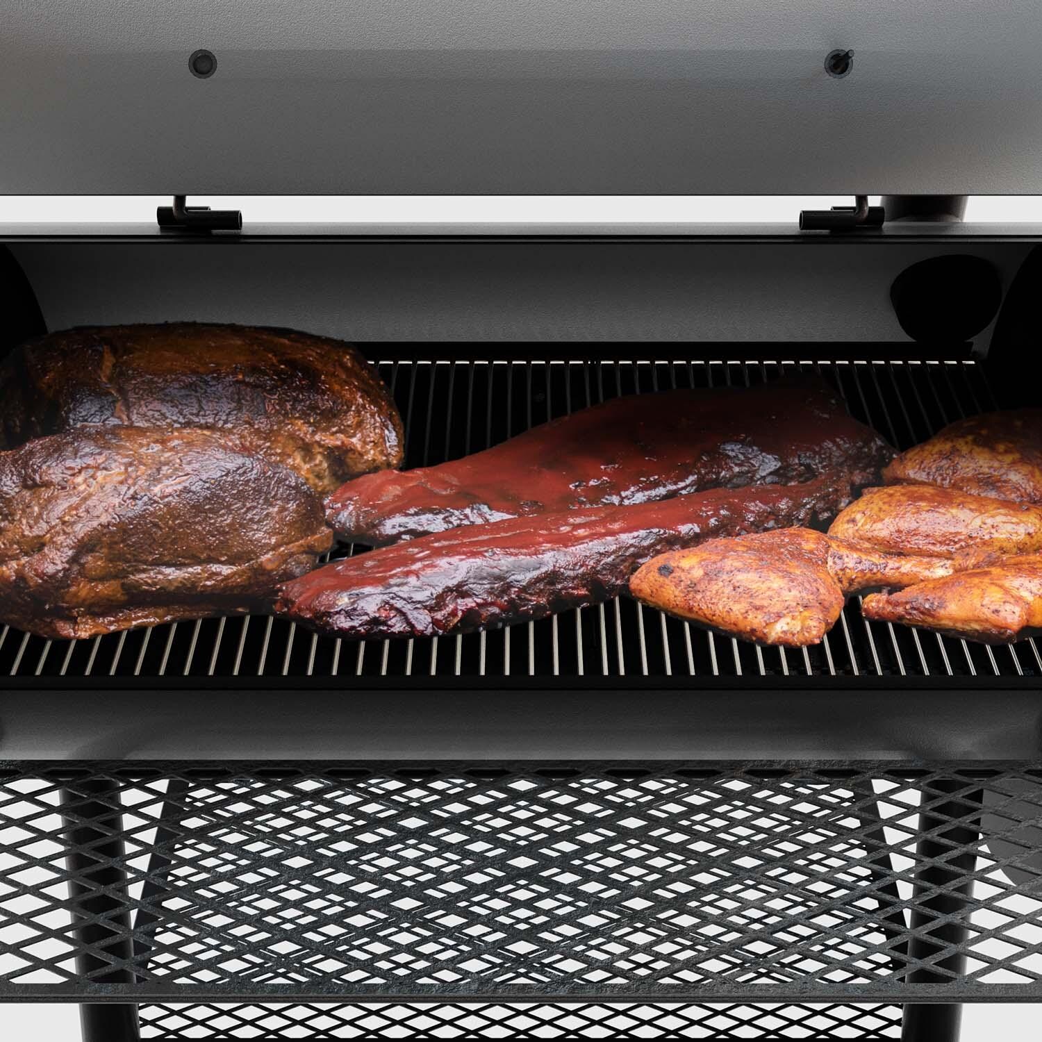 Oklahoma Joe's 17202053 Longhorn Reverse Flow Smoker - In Use - White Background thumbnail