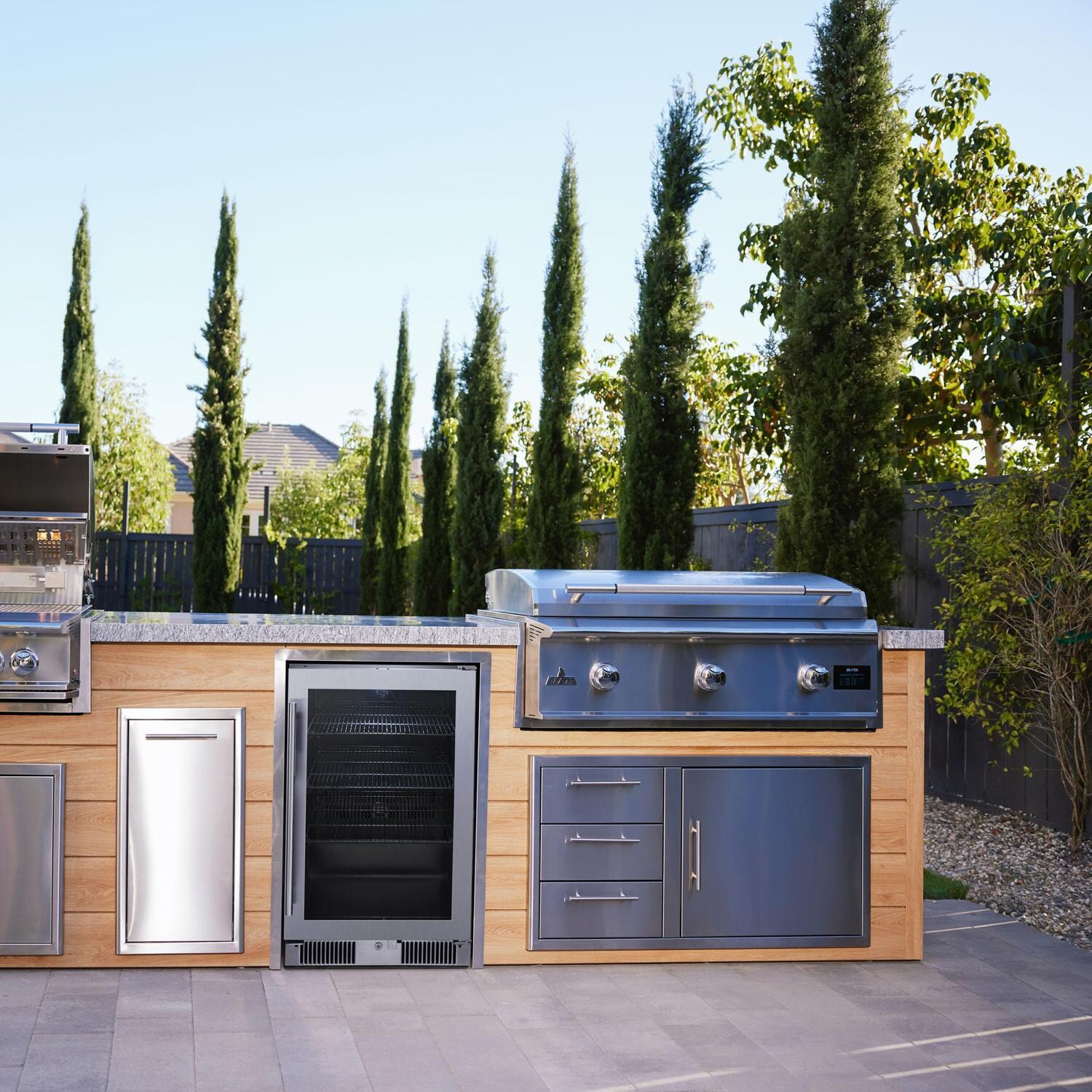 BBQGuys Signature 12 Ft Grill Island w/ 40 Inch Propane Blaze Premium LTE Pro Grill & Griddle, Beverage Center, Narrow Trash Bin & Door & Drawer | Sun Bleached Oak w/ White Granite - Right Side - Lifestyle thumbnail