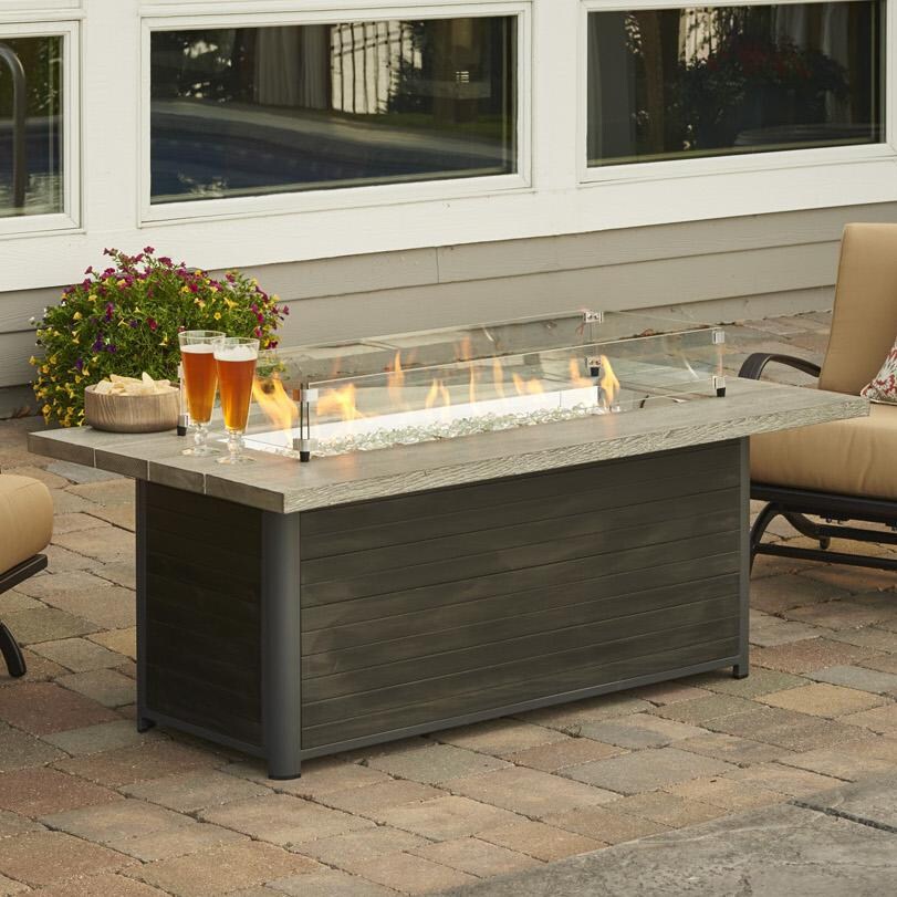 Lakeview Outdoor Designs Rusticview Linear Gas Fire Pit Table - Lifestyle - Glass wind guard pictured is optional accessory thumbnail