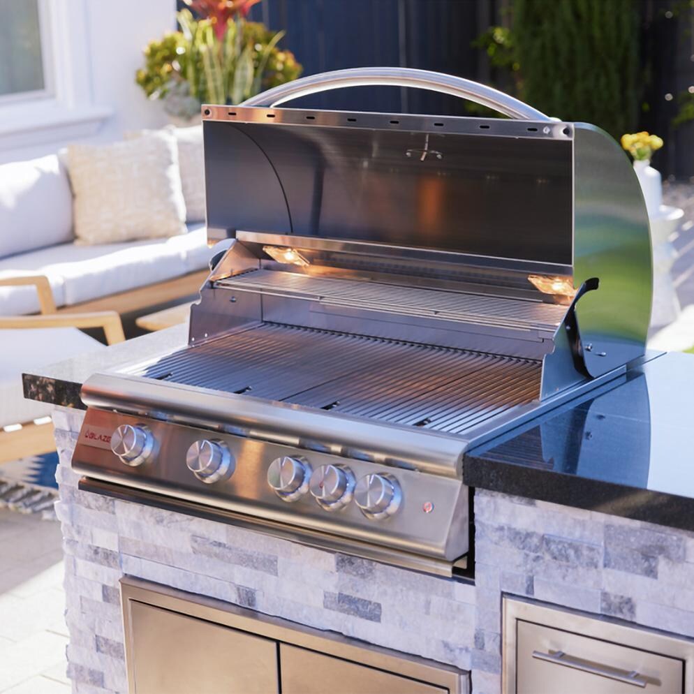 BBQGuys Signature 6 Ft Grill Island w/ 32-in Natural Gas Blaze LTE+ Grill, Refrigerator & Door & Drawer | Alaska Gray w/ Black Granite - Open Grill - Lifestyle thumbnail