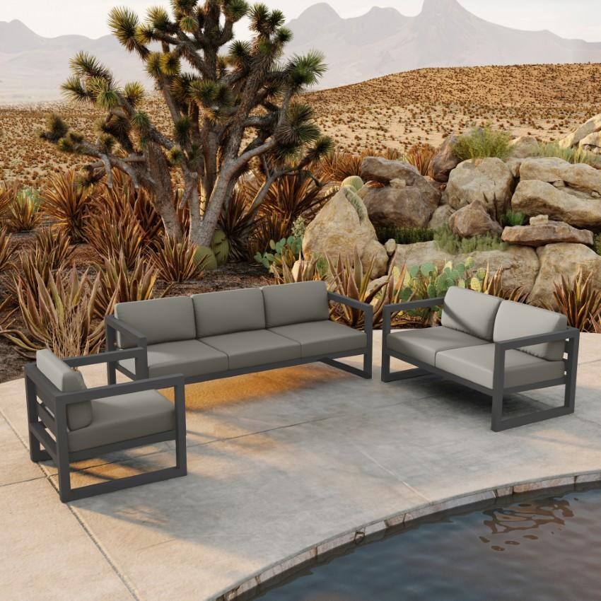 Misty Cove 3 Piece Seating Set in Slate w/Sofa & Canvas Charcoal Cushions by Lakeview - Hero - Lifestyle thumbnail