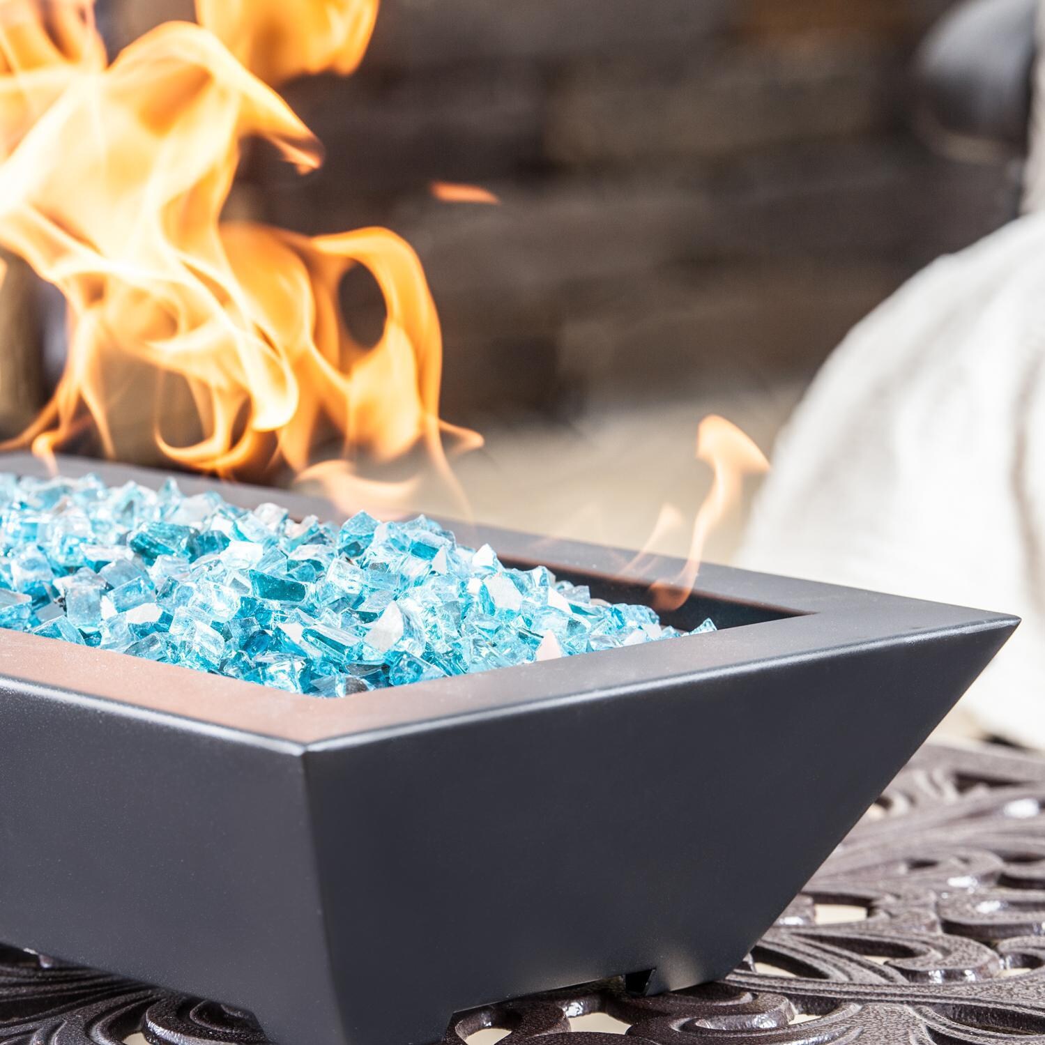 BBQGuys Signature Series Westfalen 18-Inch Table-Top Propane Fire Pit - Black - Close Up - Shown with 1/2 inch Caribbean Blue Reflective Fire Glass (Sold Separately) thumbnail