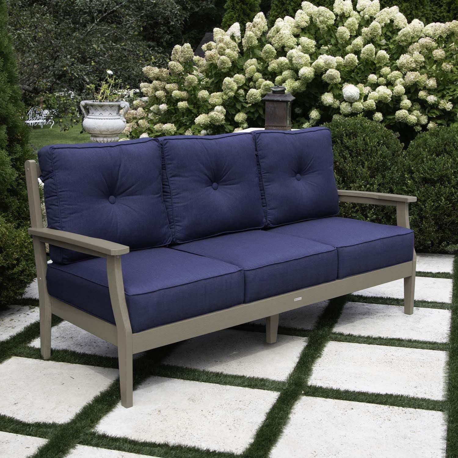 Blushing Bay 3 Person Recycled Plastic Sofa in Spectrum Indigo/Woodland Brown by Lakeview Outdoor Designs- Left Angled - Lifestyle thumbnail