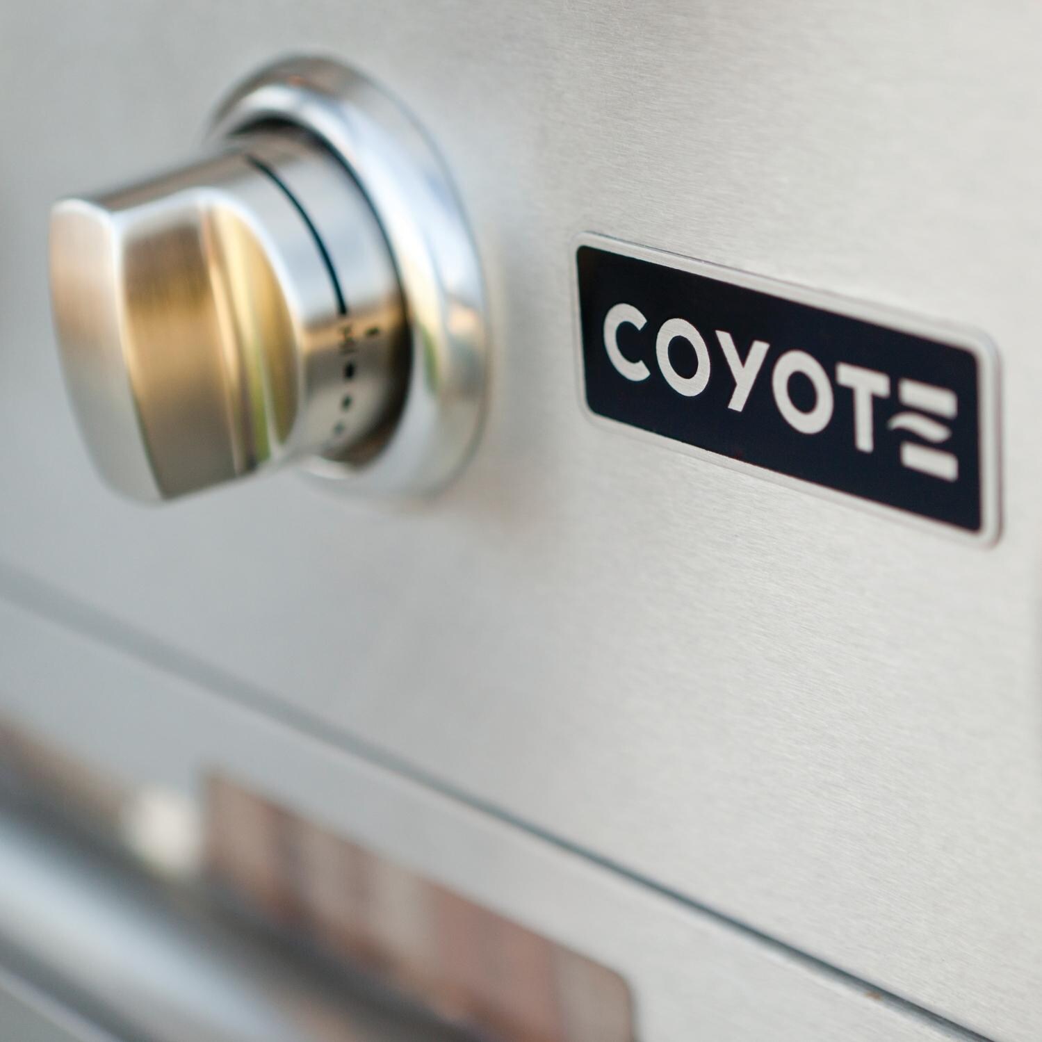 Coyote Centaur 50-Inch Propane Gas And Charcoal Hybrid Grill On Cart - Control Knob Close Up thumbnail