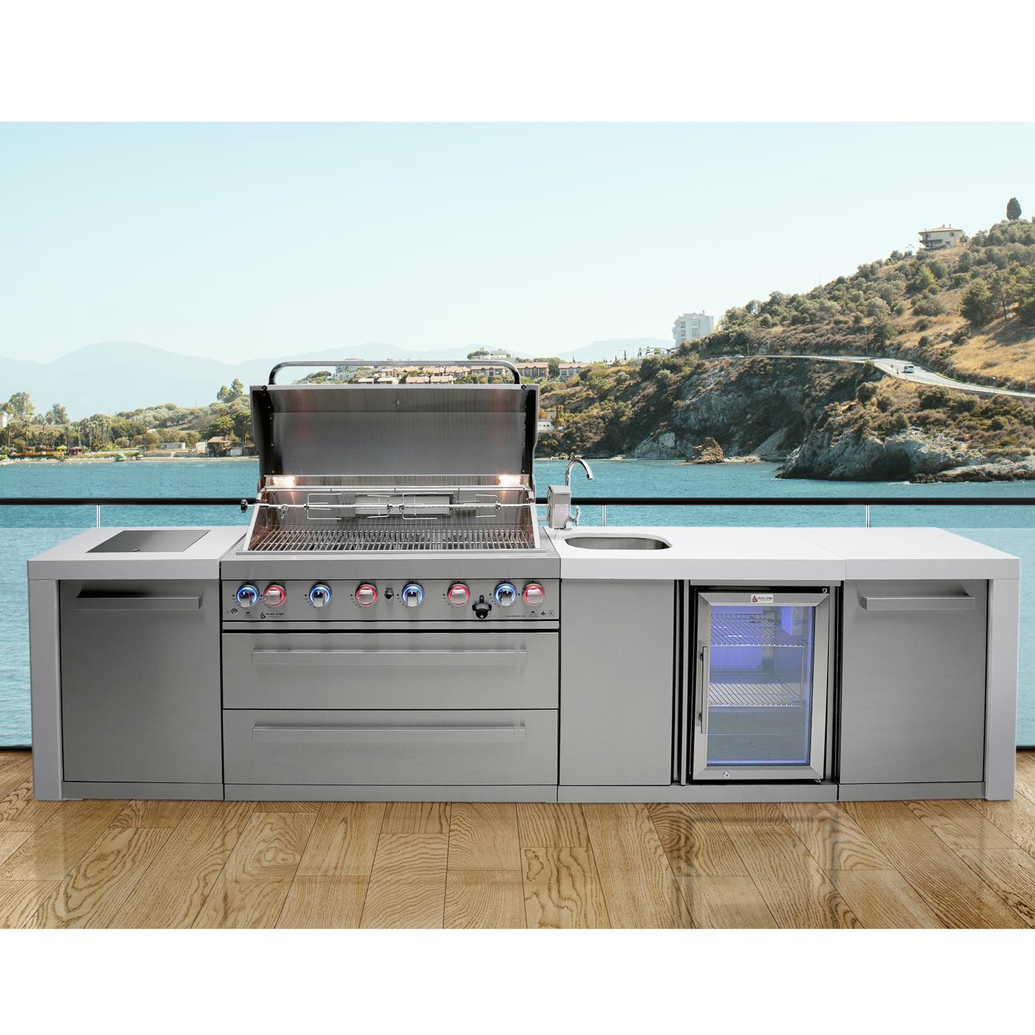 Mont Alpi MAi805-DBEV Deluxe Natural Gas Island Grill W/ Beverage Center - Overlooking the Bay - Lifestyle thumbnail