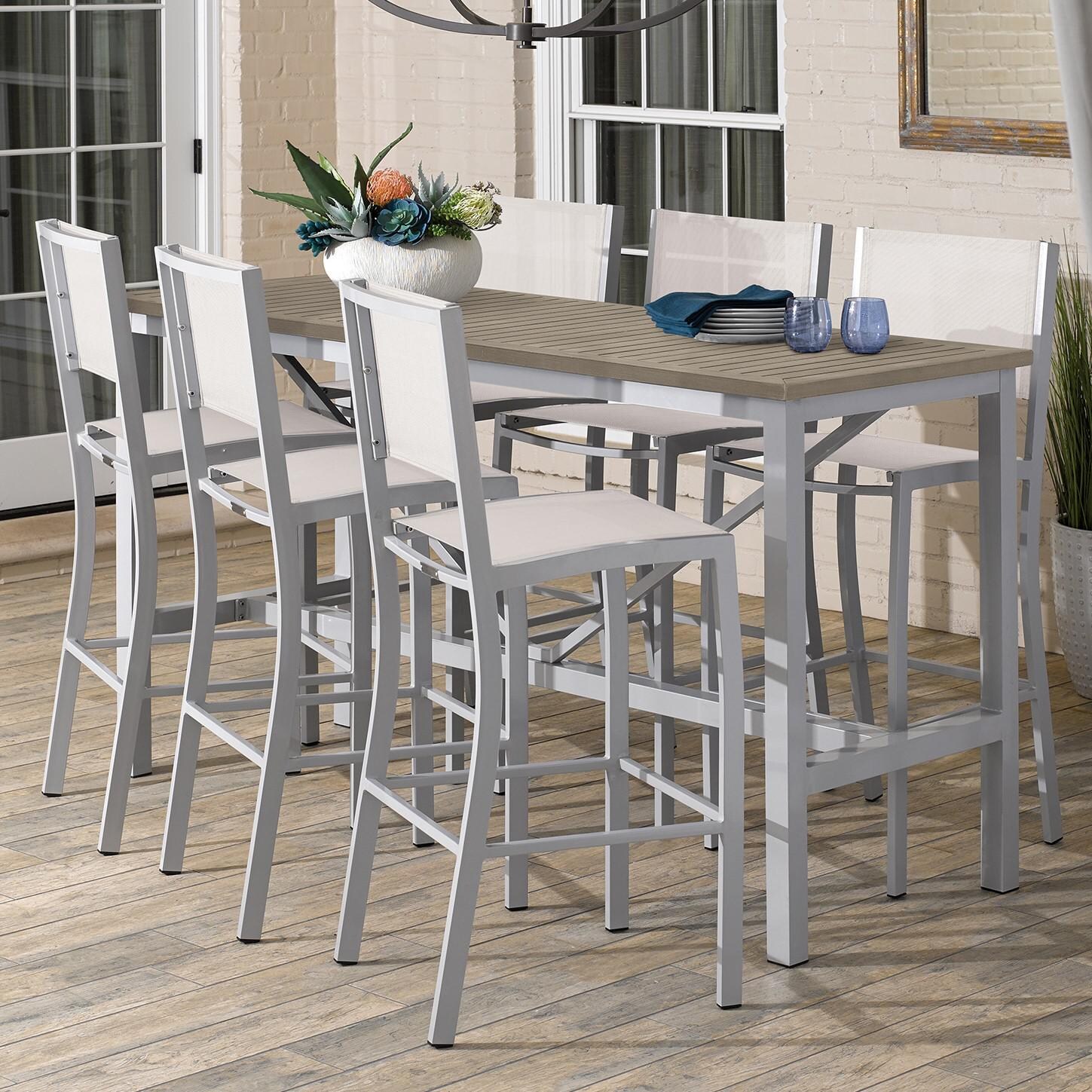Travira 7 Piece Aluminum Patio Bar Set W/ 72 X 30 Inch Rectangular Table and Tekwood Vintage Tabletop By Oxford Garden - On The Patio thumbnail