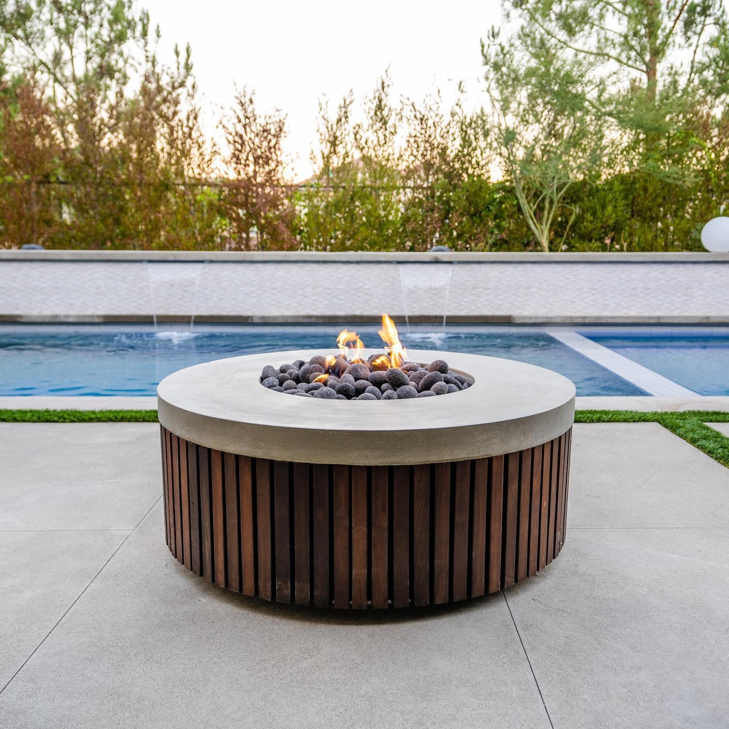 Hampton 48-in Round GFRC Propane Fire Pit in Natural by Prism Hardscapes