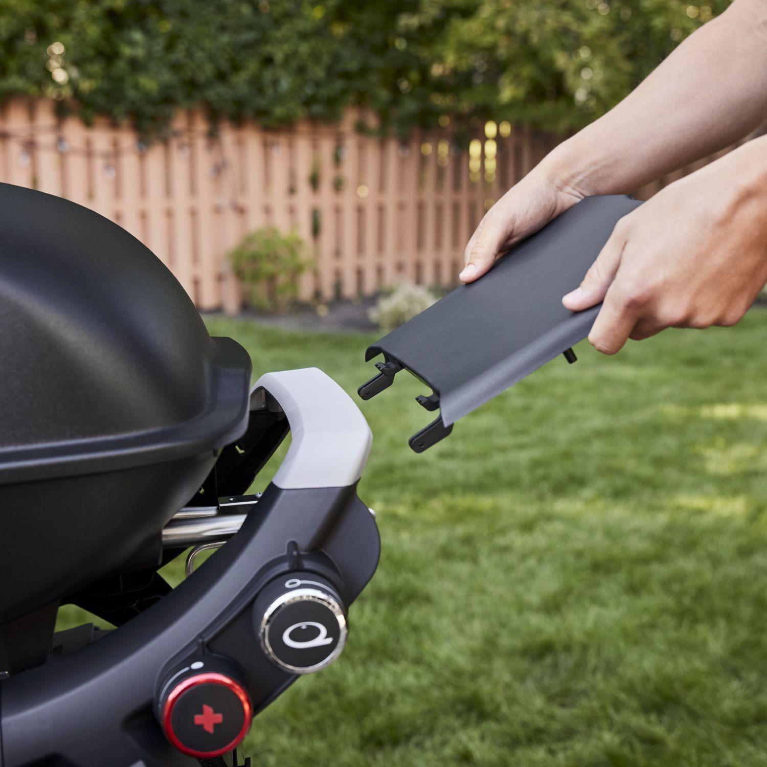 Weber 1500375 Q2800N+ Portable Propane Gas Grill in Midnight Black - Side Table Shown in Charcoal Gray - Detail thumbnail