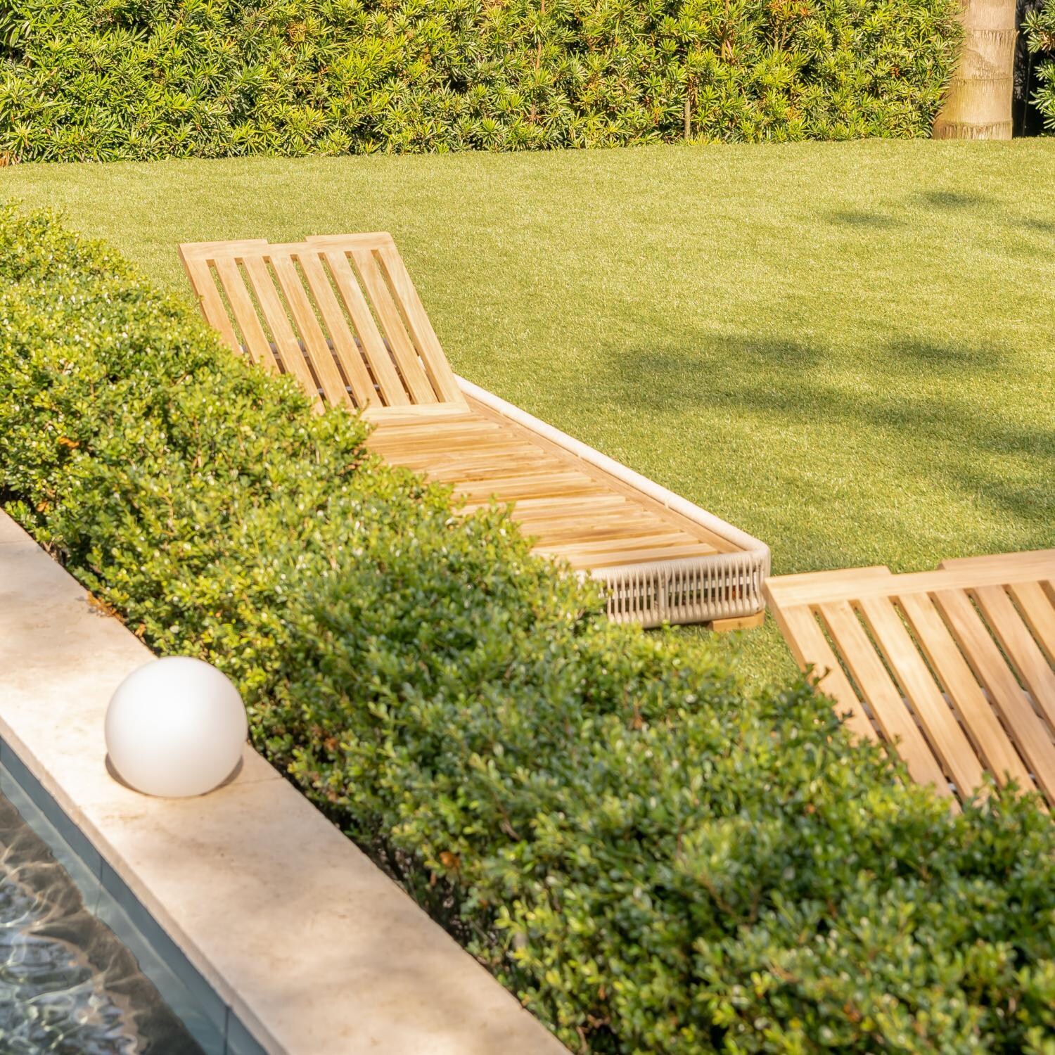 Teak + Table Breeze Olefin Rope & Teak Patio Chaise Lounge in Dune/Granite - Side View, Frame Only - Lifestyle thumbnail