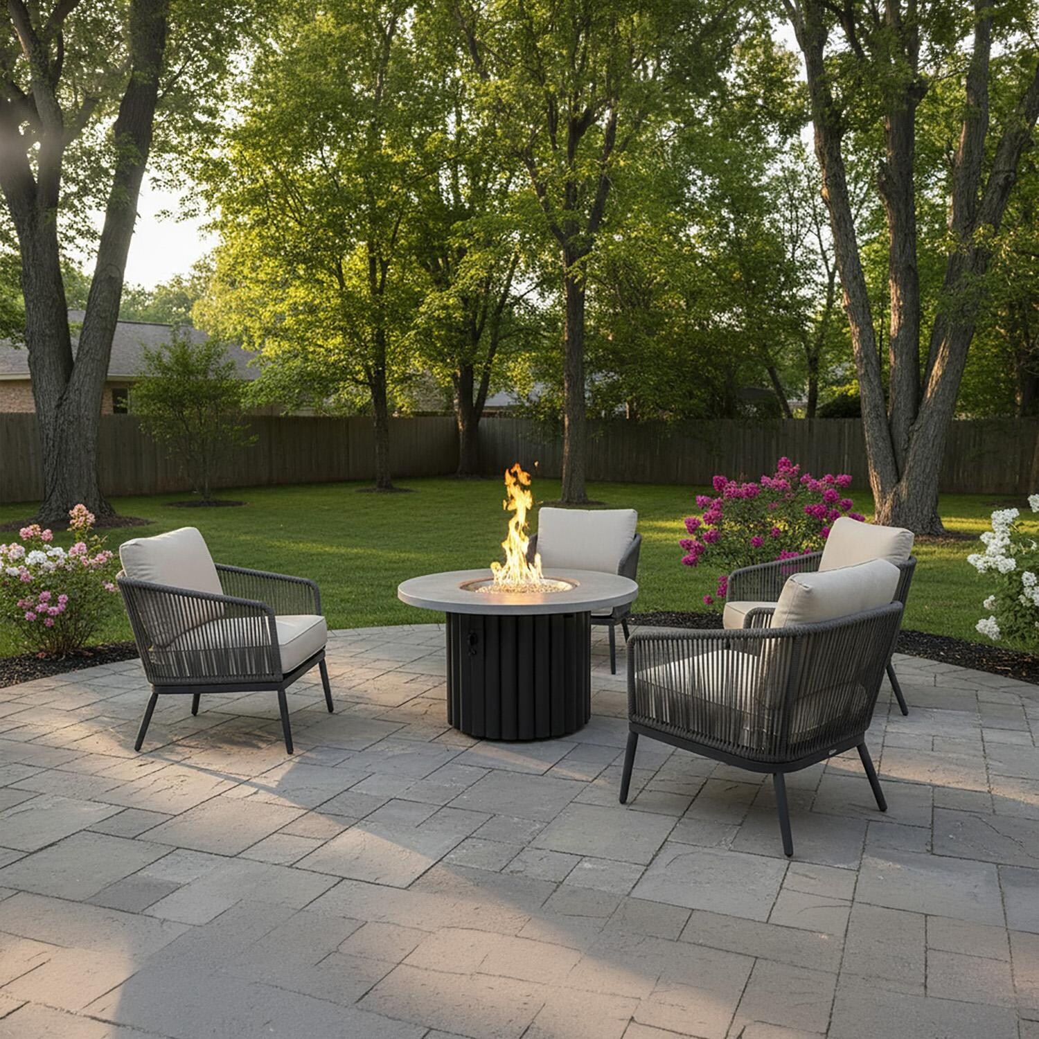 Reverie REVRBL-48-K-NG 48-in Round Aluminum Natural Gas Fire Pit Table w/ Relic Grey Supercast Top & Black Base (Ships Propane w/ Conversion Kit) - On Patio - Lifestyle thumbnail