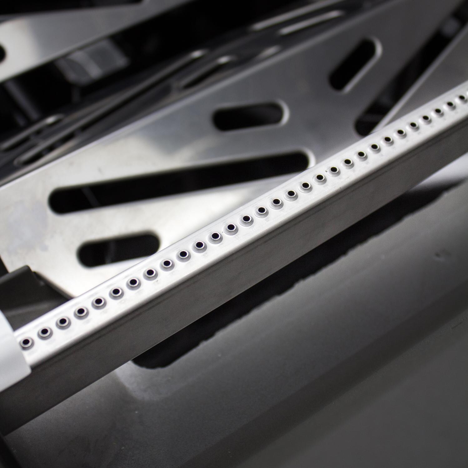 Weber Genesis II LX S-240 Freestanding Natural Gas Grill - Burner Ports Close-Up thumbnail