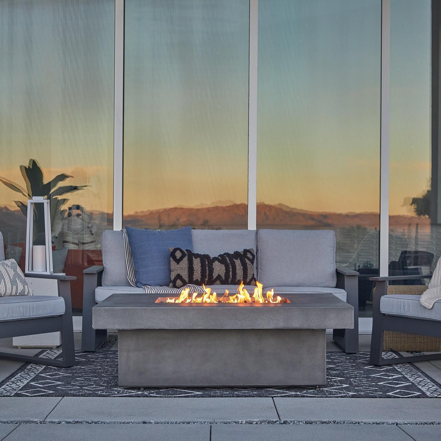 Hickory Bay 3708LP-SMK 60 Inch Rectangular GFRC Propane Fire Pit Table in Smoke by BBQGuys Signature - Patio Close Up - Lifestyle thumbnail