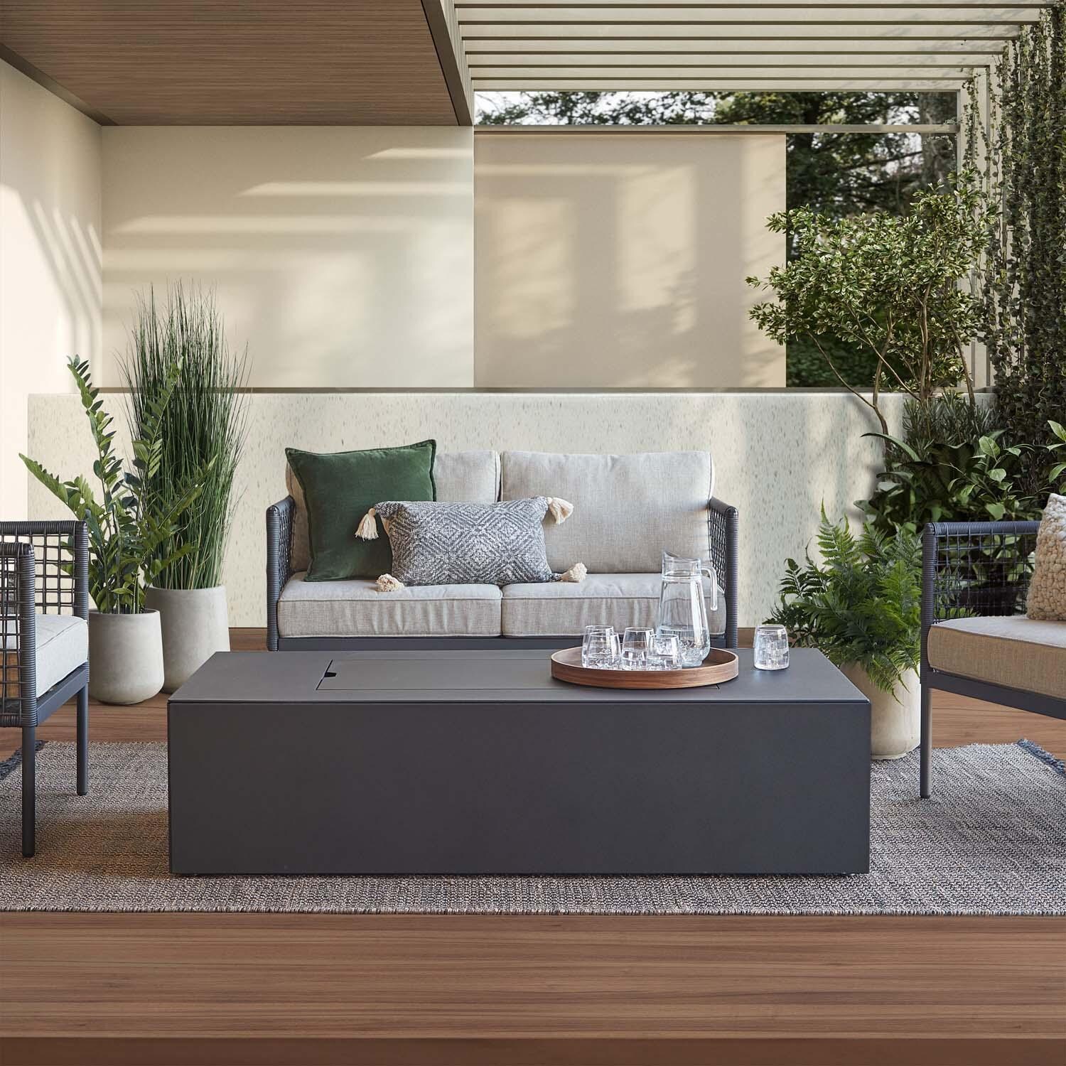 Covewood 58 Inch Rectangular Aluminum Propane Fire Pit Table w/ Hidden Propane Tank in Charcoal by BBQGuys Signature - With Lid - Lifestyle thumbnail