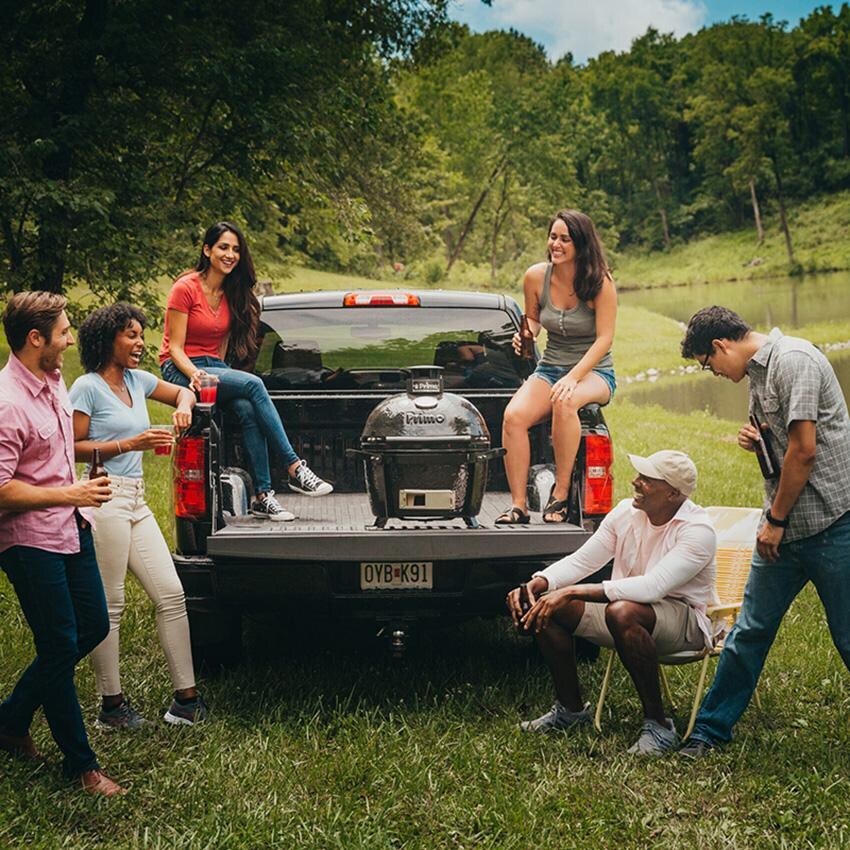 Primo PGCJRH Oval Junior 200 Ceramic Kamado Grill On GO Portable Carrier With Stainless Steel Grates - On the Go - Lifestyle thumbnail