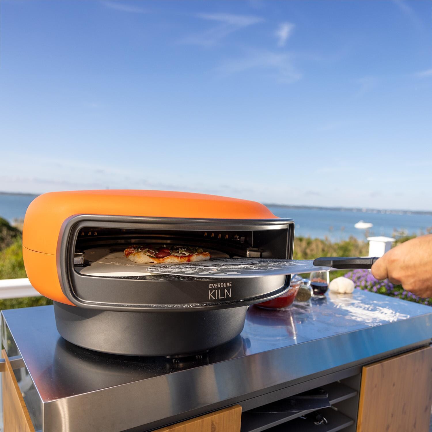 Everdure EKILN1TUS 1-Burner KILN Pizza Oven - Terracotta - Baking Pizza - Lifestyle