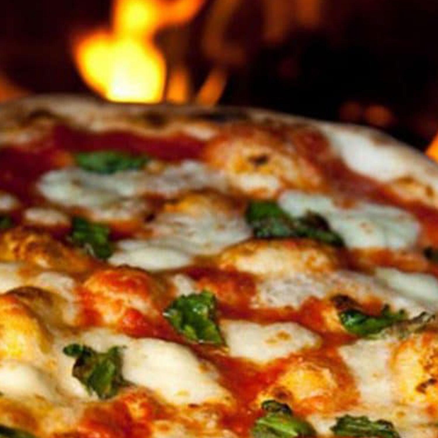 XO Appliance XOPIZZA1SS PIZZA1 Countertop Wood-Fired Pizza Oven in Black / Stainless Steel - Baked Pizza - Lifestyle thumbnail