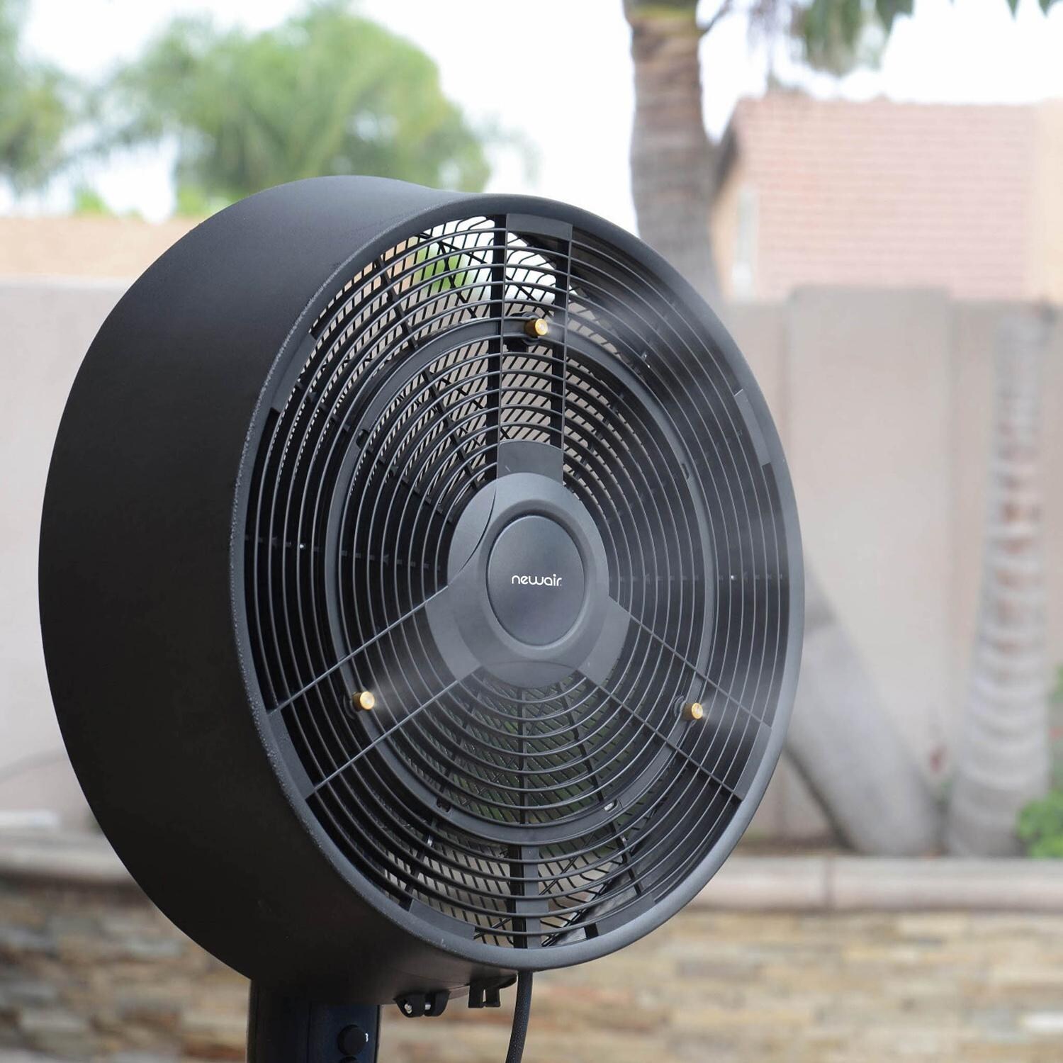 NewAir FMF2K5BK00 18-in Misting & Oscillating Pedestal Fan for Indoor & Outdoor w/ Adjustable Height & Head Tilt - 1600 CFM - On Patio Up Close - Lifestyle thumbnail