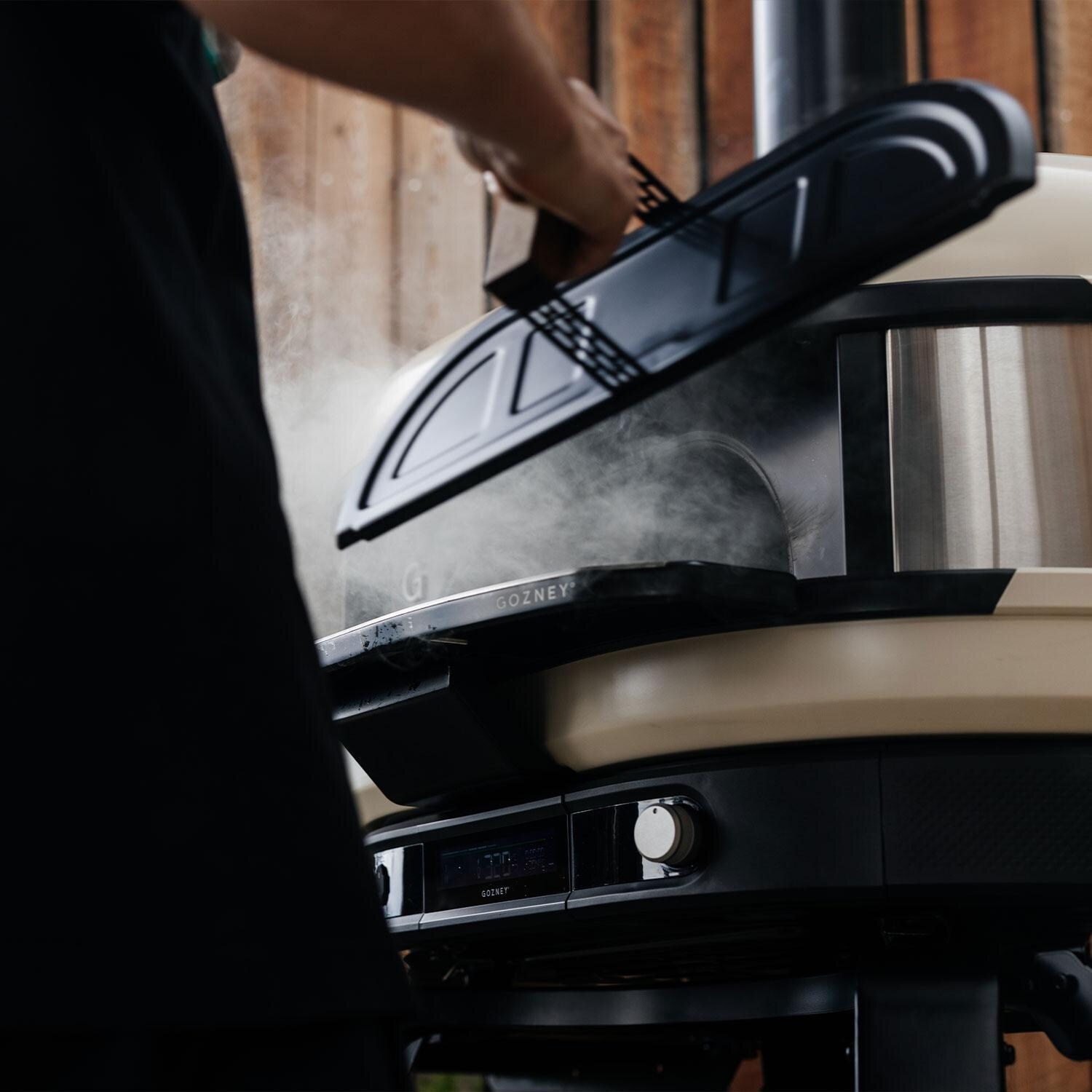 Gozney AM1993 Dome XL Gen 2 Pizza Oven Door - Black - Attaching to Oven - Lifestyle thumbnail