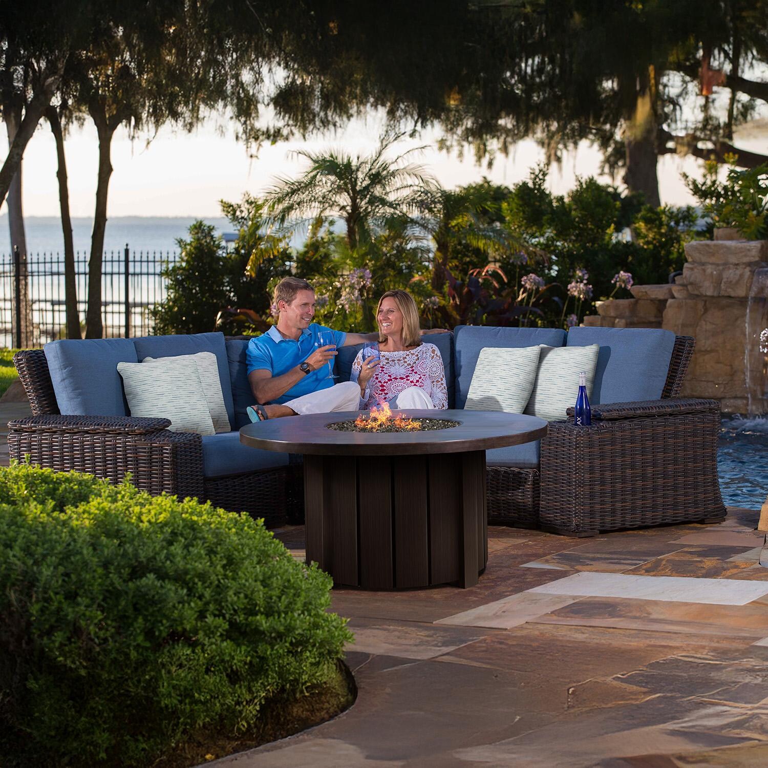 Trevi 50 Inch Round Aluminum Propane Fire Pit w/ Lid in Chestnut By Ebel - Shown w/Set - Lifestyle thumbnail