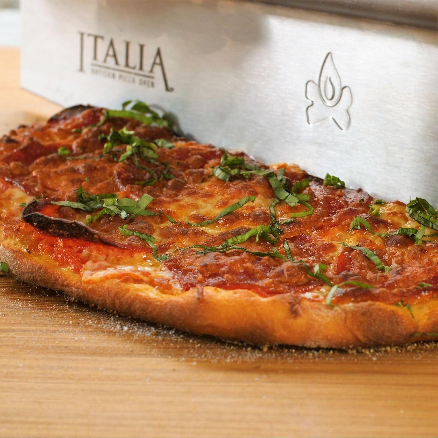 Camp Chef Italia 14-Inch Stainless Steel Rocking Pizza Cutter - Cutting Pizza thumbnail