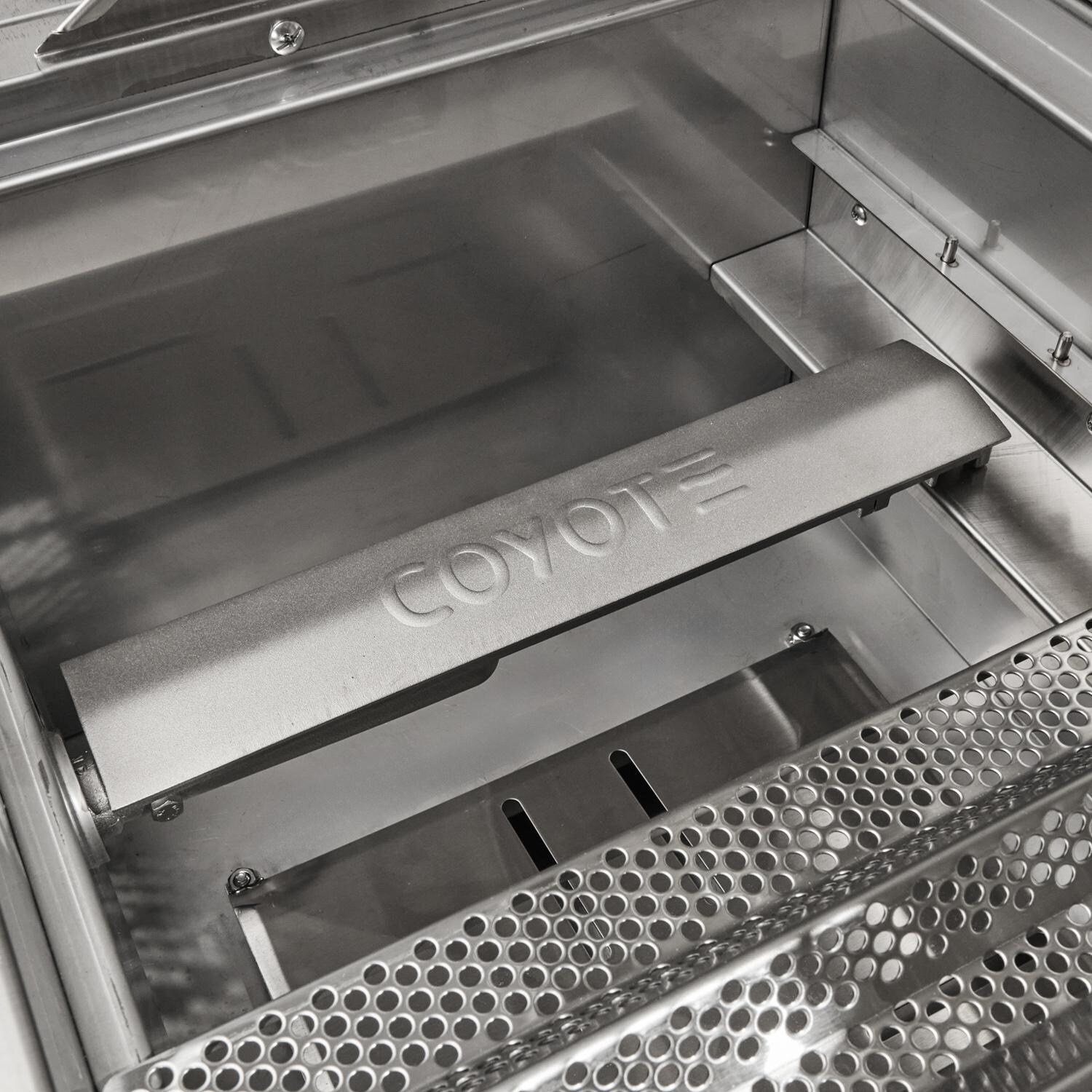 Coyote Outdoor Living Coyote 50 Inch Freestanding Natural Gas / Charcoal Hybrid Grill - Burner Up Close - Detail thumbnail