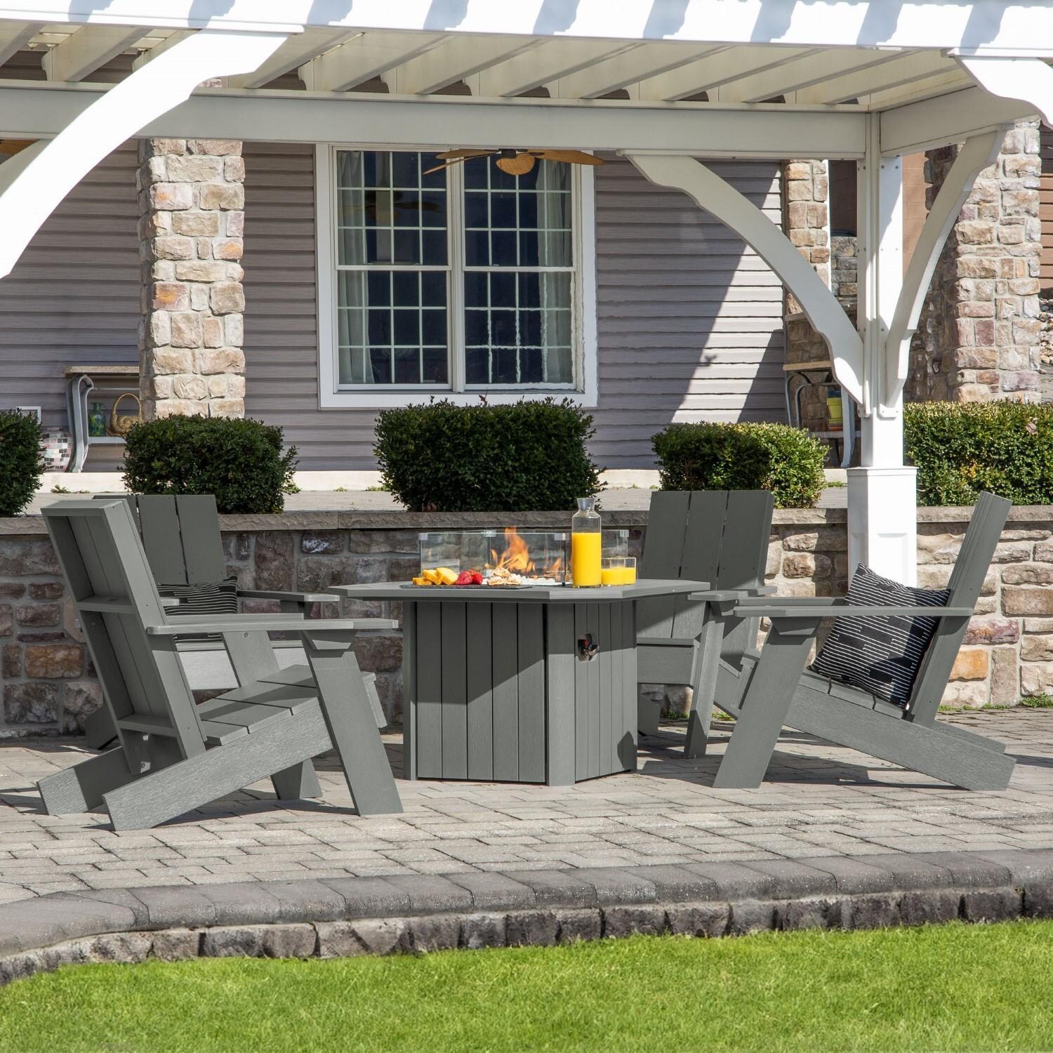Harborview 5 Pc Adirondack Set W/ Fire Pit Table in Coastal Teak by Lakeview Outdoor Designs - Side View - Lifestyle thumbnail