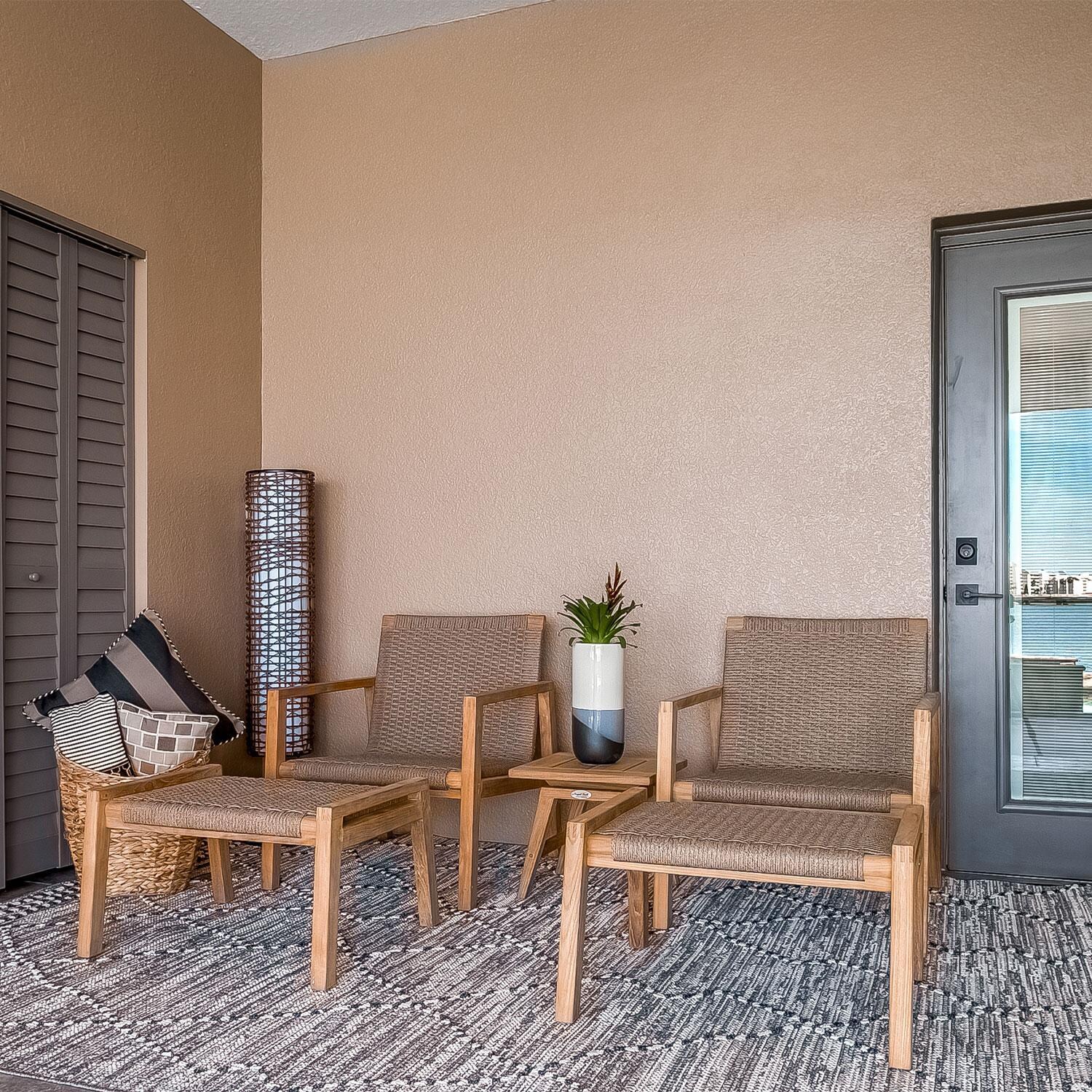 Admiral 4 Pc Club Chair w/ Ottoman Set in Brown Sand by Royal Teak Collection - By The Pool - Lifestyle thumbnail