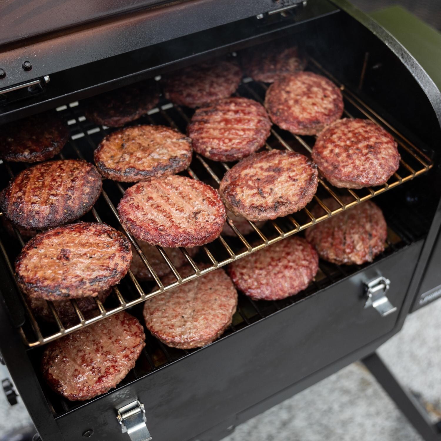 Camp Chef Pursuit 20 Portable Wood Pellet Grill - Grilling Burgers thumbnail