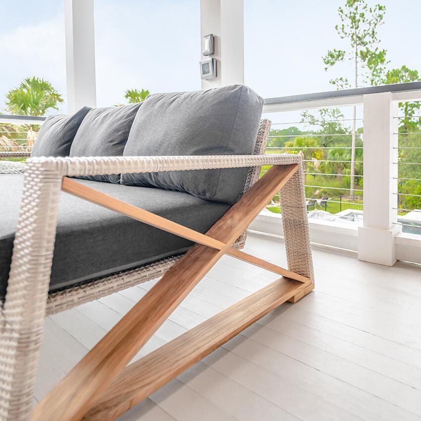 Teak + Table Caicos Sofa in Natural - Sofa Detail (Carbon Cushions Shown) - Lifestyle thumbnail